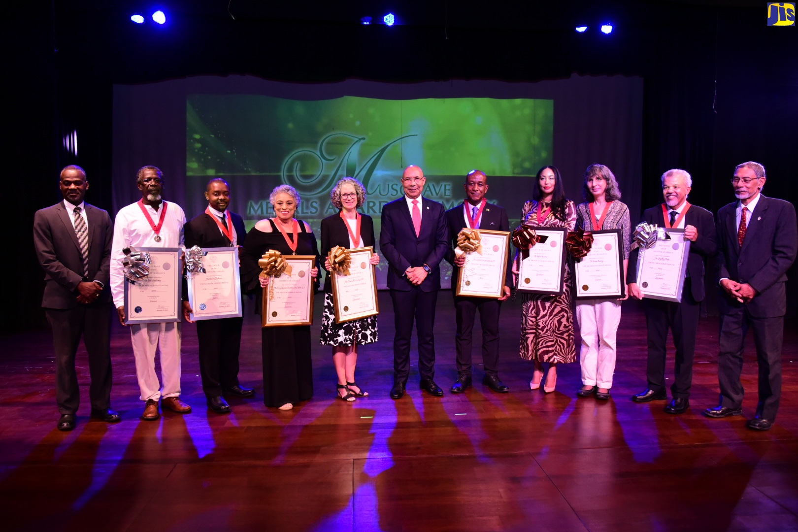 Governor-General, His Excellency the Most Hon. Sir Patrick Allen (sixth left), with the 2022 Musgrave Medal recipients at the awards ceremony held on Tuesday (November 22) at the Philip Sherlock Centre for the Creative Arts, University of the West Indies, Mona Campus, St. Andrew. Also in the picture are the Permanent Secretary of the Ministry of Culture, Gender, Entertainment and Sport, Denzil Thorpe (left) and Member of Council, Institute of Jamaica (IOJ) and Chairman, Natural History Museum of Jamaica, Professor Emeritus Ronald Young (right).
