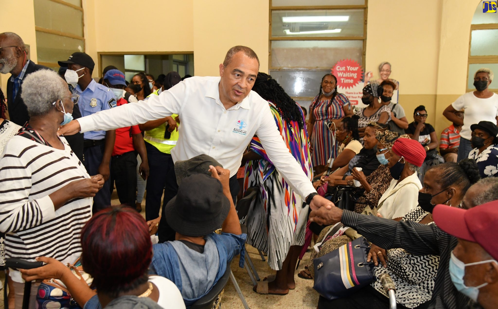Minister of Health and Wellness, Dr. the Hon. Christopher Tufton (centre), interacts with patients at the Kingston Public Hospital (KPH), during the launch of the Compassionate Care Programme at the institution on Thursday (November 17).