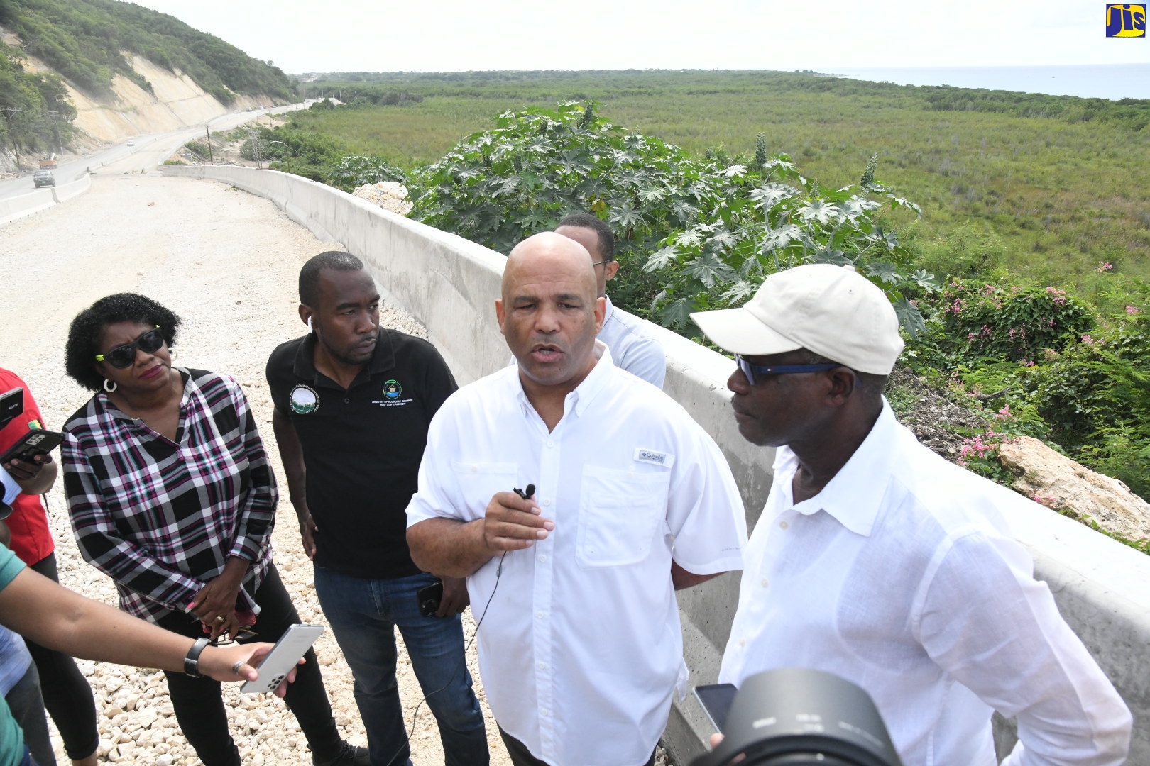 Minister without Portfolio in the Ministry of Economic Growth and Job Creation, Hon. Everald Warmington (right) and Member of Parliament for St. Thomas Western, James Robertson, address members of the media during a tour of the constituency, on Wednesday (November 2).
