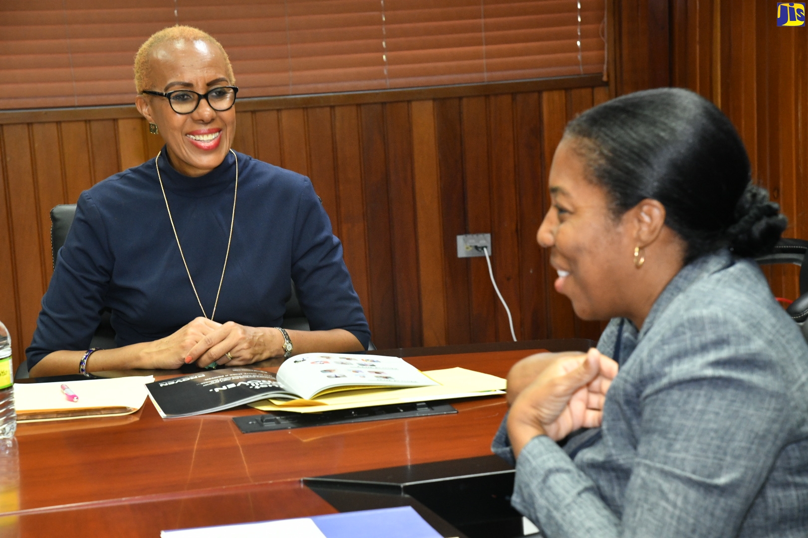 Minister of Education and Youth, Hon. Fayval Williams (left), enjoys a conversation with Director, Future Leaders of Jamaica, Thornia Smith, when the youngster visited the Minister's National Heroes Circle offices in Kingston on November 22. Future Leaders of Jamaica provides scholarships to primary- and secondary-level students in financial need who demonstrate a commitment to learning, community service, and academic excellence.