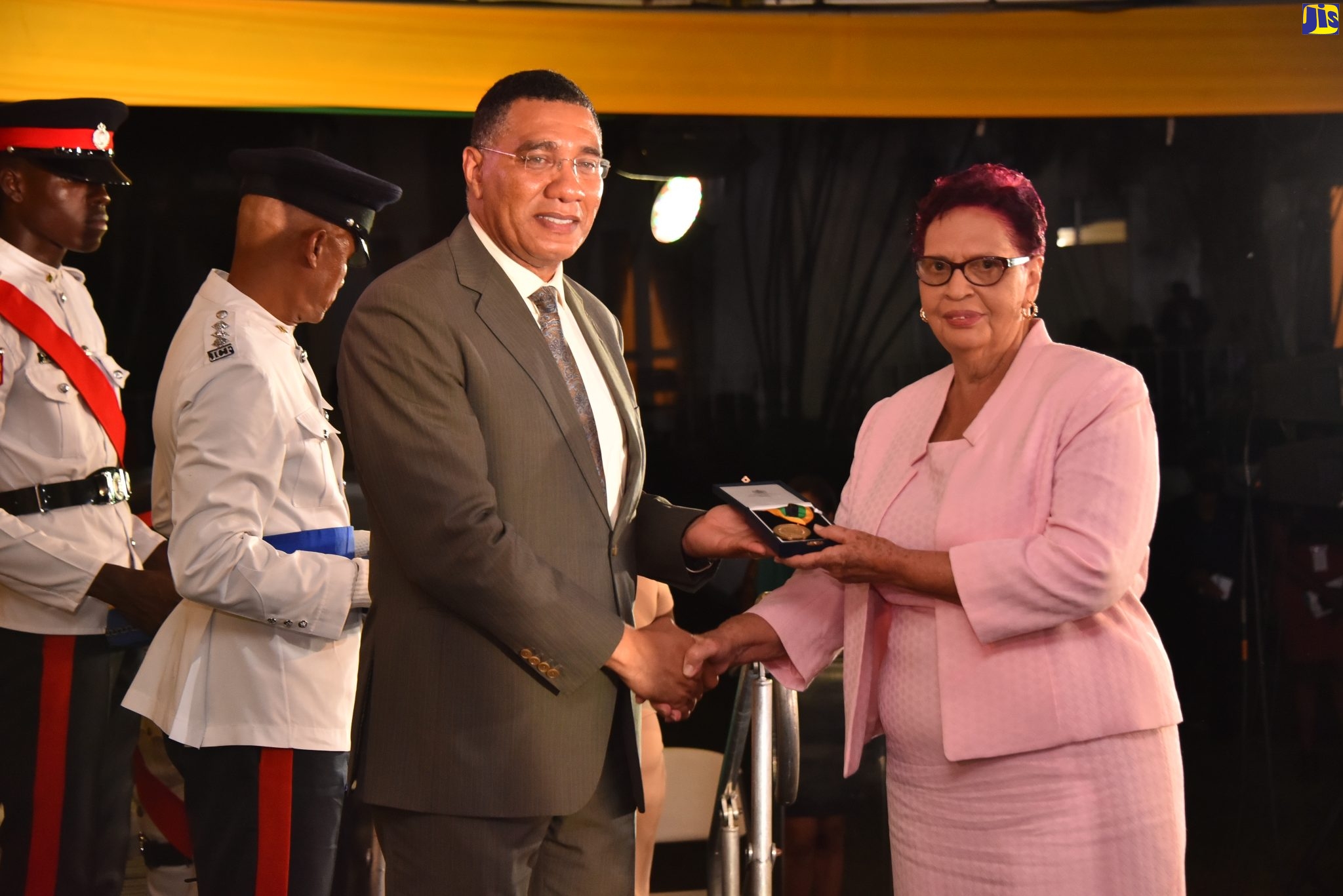 Prime Minister, the Most Hon. Andrew Holness, presents the Prime Minister’s Medal of Appreciation for Service to Education to retired Westmoreland educator, Theresa Lindo, during the ceremony held at Jamaica House in September.
