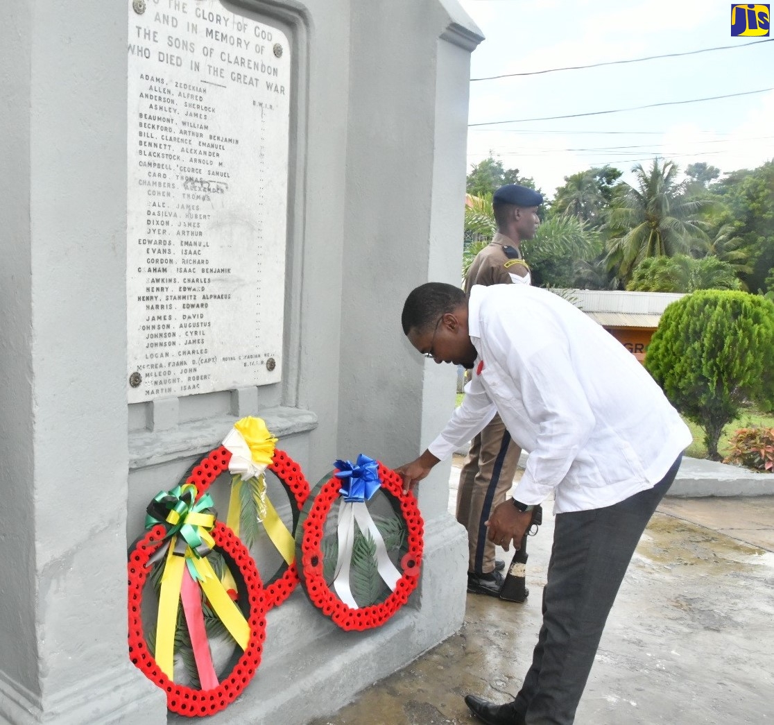 Minister without portfolio in the Office of the Prime Minister, Hon. Robert Morgan, who is also Member of Parliament for Clarendon North Central, lays a wreath at the War Monument in Chapelton, Clarendon, on Sunday (November 13), to commemorate Remembrance Day.

