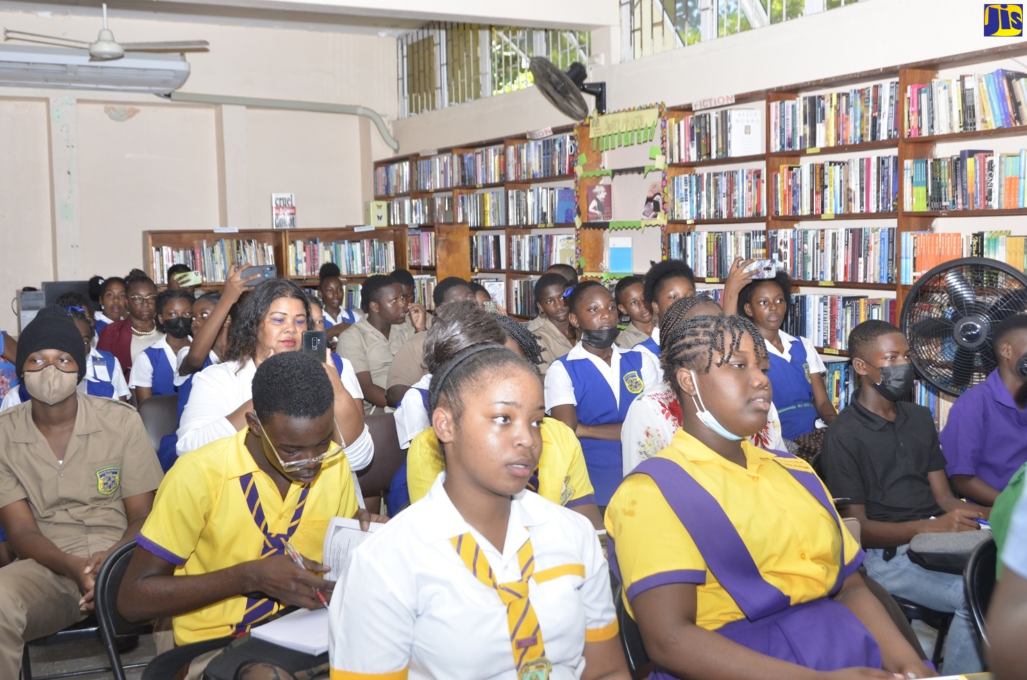 High-school students and teachers being engaged during the recent Jamaica 60 Heritage Lecture and Exhibition, hosted by the Hanover Parish Library in partnership with the Jamaica Information Service (JIS). The event was held at the library in Lucea, Hanover.