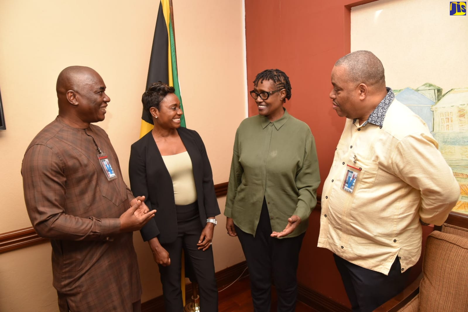 Minister of State in the Ministry of Health and Wellness, Hon. Juliet Cuthbert-Flynn (second left), engages with Under Secretary-General and Executive Director, Joint United Nations Programme on HIV/AIDS (UNAIDS), Winifred Byanyima (second right), following her arrival at the Norman Manley International Airport in Kingston on Sunday (November 6). Sharing in the moment (from left) are UNAIDS Country Director for Jamaica, Belize, Suriname and the Organization of Eastern Caribbean States (OECS), Richard Amenyah and United Nations Resident Coordinator for Jamaica, Dr. Garry Conille. Ms. Byanyima, who is on a six-day visit to Jamaica, will be the keynote speaker at the National HIV Annual Review on November 9. She will also participate in a series of meetings and events with the Ministry of Health and Wellness and UNAIDS. Ms. Byanyima is slated to depart the island on November  11.