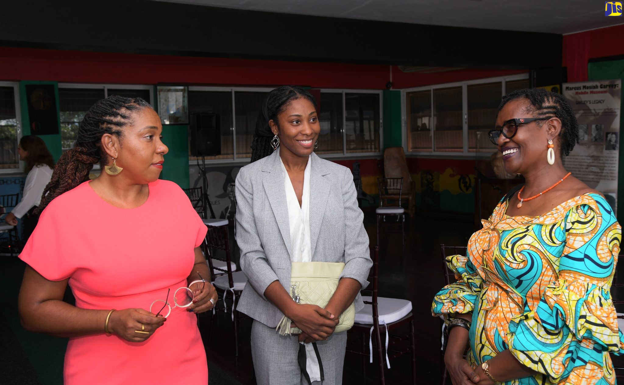 Government Senator Natalie Campbell Rodriques (l), representing the Minister of Culture Gender Entertainment and Sport, Hon. Olivia Grange, engages Under Secretary-General and Executive Director of the Joint United Nations Programme for HIV/AIDS (UNAIDS),  Winifred Byanyima (r) and President of the Jamaica Union of Tertiary Students, Christina Williams. Occasion was a Women’s Forum at Liberty Hall in Kingston on Thursday, November 10. The forum was one of a series of activities by Ms. Byanyima as part of an official visit to the island from November 6-11. 