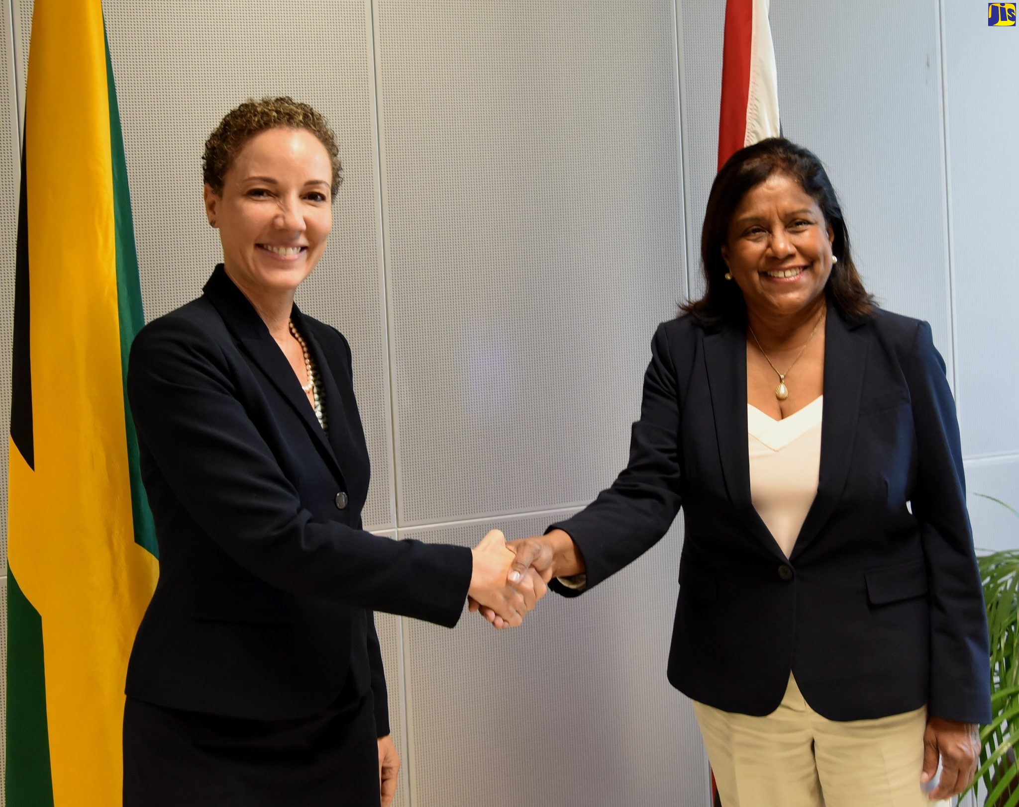 Minister of Foreign Affairs and Foreign Trade, Senator the Hon. Kamina Johnson Smith (left), greets Trinidad and Tobago’s Minister of Trade and Industry, Hon. Paula Gopee-Scoon, during a recent courtesy call at the Ministry’s offices in Kingston.