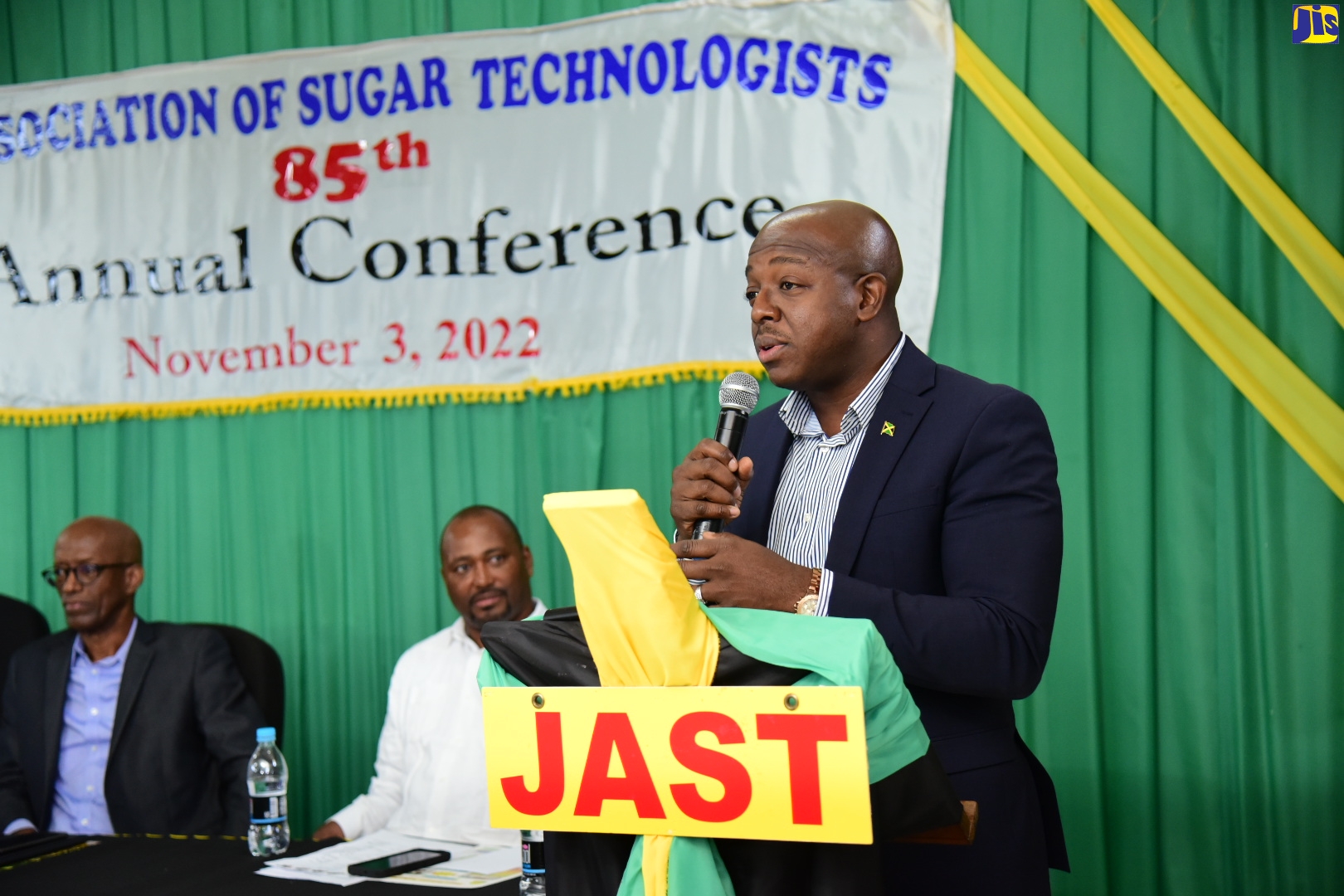 Minister of Agriculture and Fisheries, Hon. Pearnel Charles Jr. (right), addresses the 85th annual conference of the Jamaica Association of Sugar Technologists (JAST) on Thursday (November 3), at the Sugar Industry Authority’s Research Division in Mandeville, Manchester. Listening are (from left) Sugar Industry Authority Chairman, Clement Lawrence and JAST President, Michael Martin.