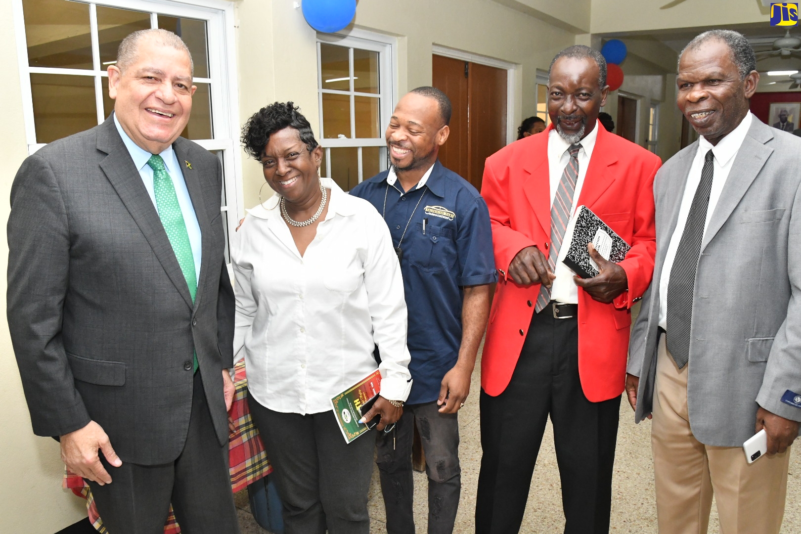 Minister of Transport and Mining, Hon. Audley Shaw (left), with (from left) First Vice President, Taxi Operators Development Sustainable Services (TODSS), Henrita James; President, Falmouth Taxi Association, Sheldon Malcolm; One Voice Transport Group, Lorraine Finnikin; and President, TODSS, Egeton Newman. They were attending TODDS ninth 40-day Road Safety Awareness Campaign Stakeholders Partnership Round Table Conference, on Thursday (December 8), at Boulevard Baptist Church in Kingston.