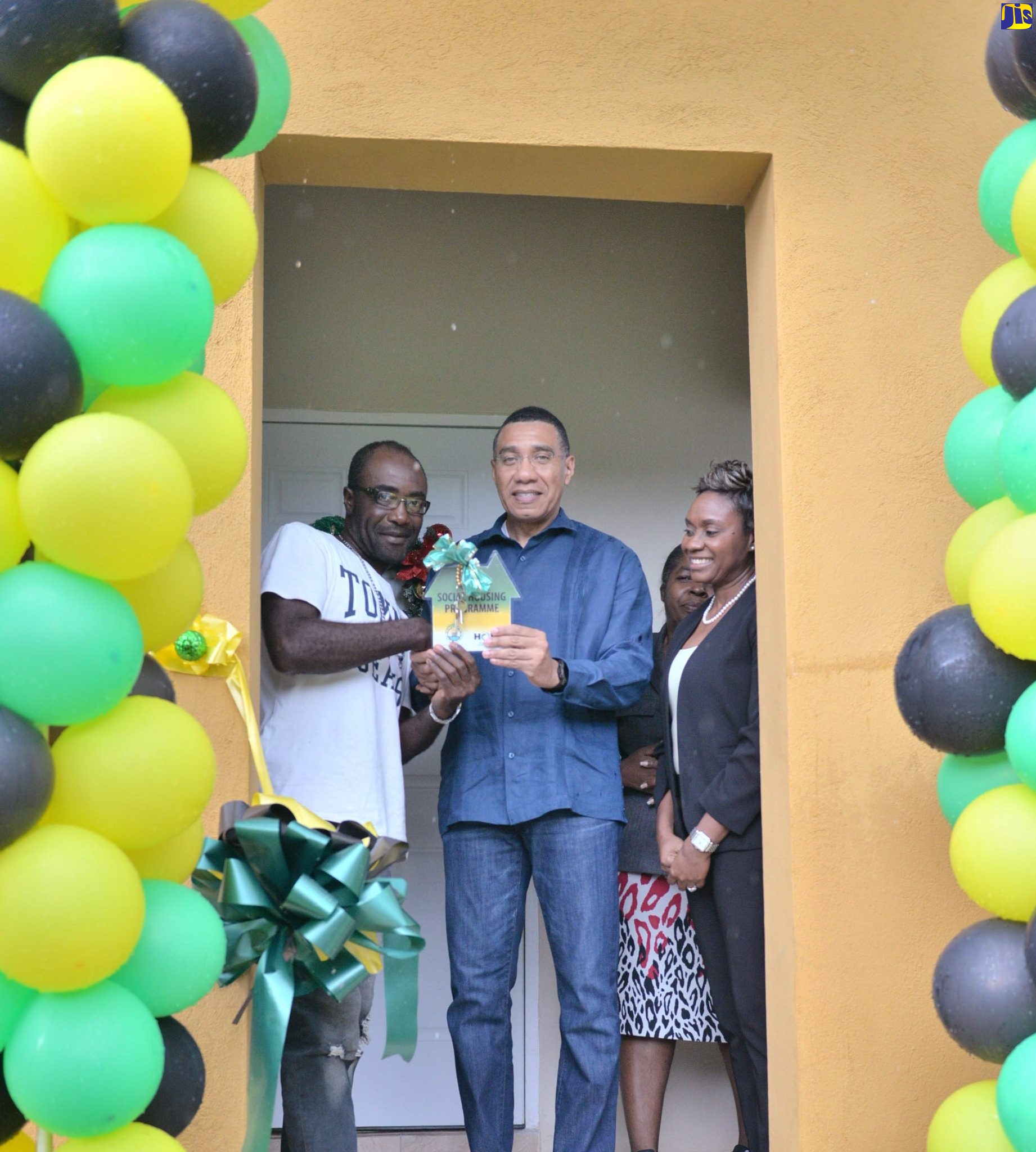 PHOTOS: PM Holness Hands Over New House in Rock Hall