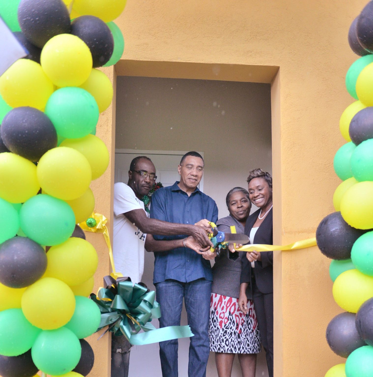 PHOTOS PM Holness Hands Over New House in Rock Hall Jamaica
