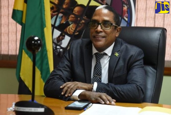 State Minister in the Ministry of Industry, Investment and Commerce, Dr. the Hon. Norman Dunn.