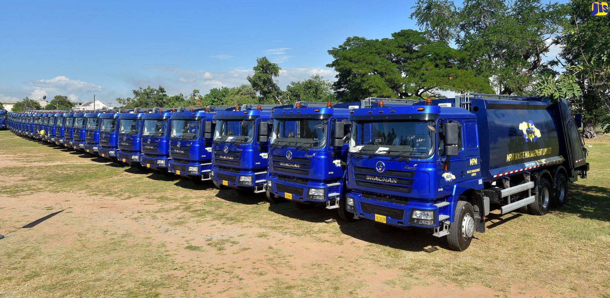 (FILE) Some of the 50 new garbage trucks that were officially handed over to the National Solid Waste Management Authority (NSWMA) by Prime Minister, the Most Hon. Andrew Holness, during a ceremony at National Heroes Park in Kingston, on November 30.