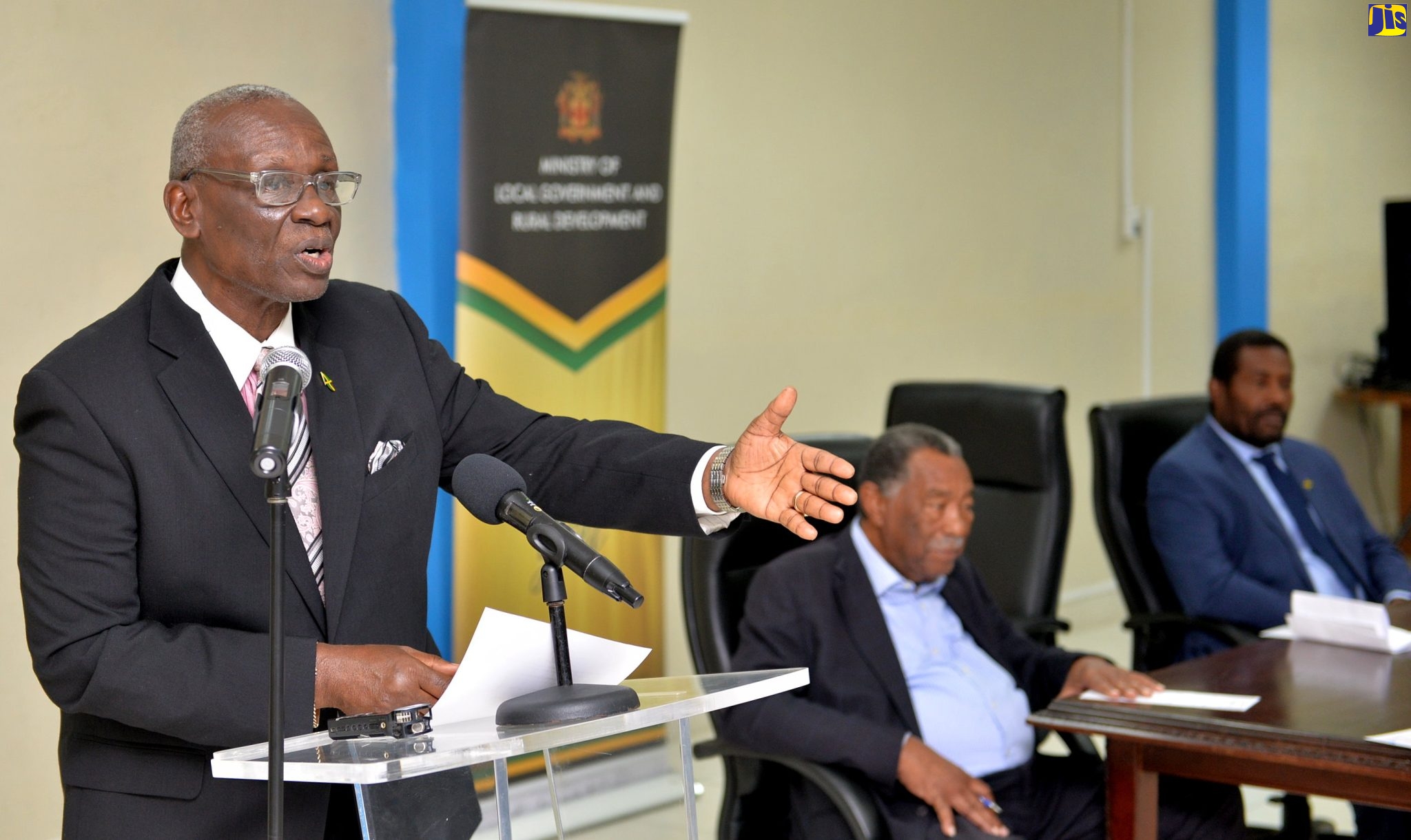 Minister of Local Government and Rural Development, Hon. Desmond McKenzie, addresses the Beckford Lodge Road, Eastern Westmoreland rehabilitation project contract-signing ceremony at the Ministry’s offices in Kingston, on Wednesday (December 7).