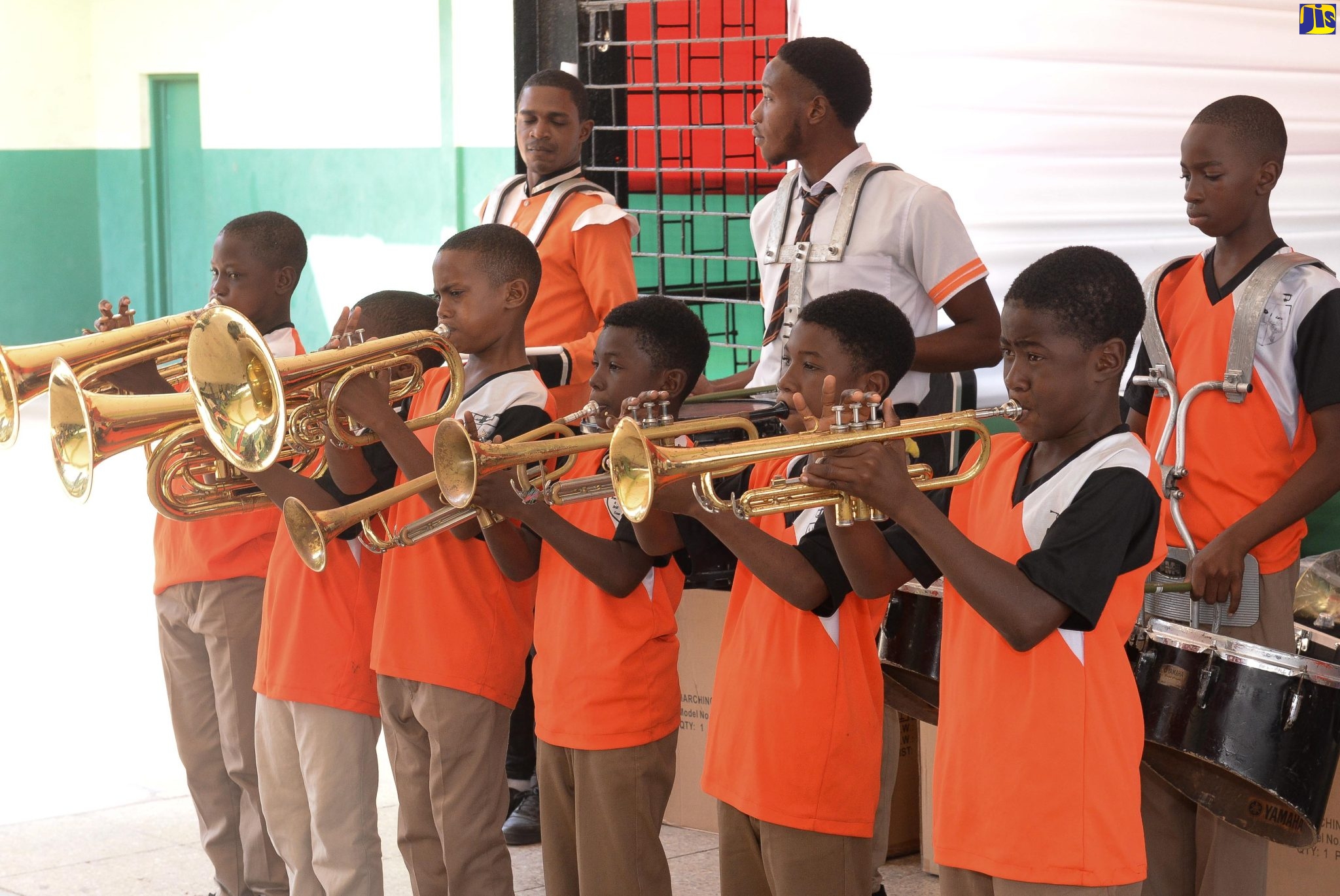 Members of the Tivoli Gardens Drum Corps perform during the ceremony for the official handover of musical instruments, procured through a $2-million grant from the Culture, Health, Arts, Sports, and Education (CHASE) Fund, at the Tivoli Gardens Community Centre in Kingston recently.