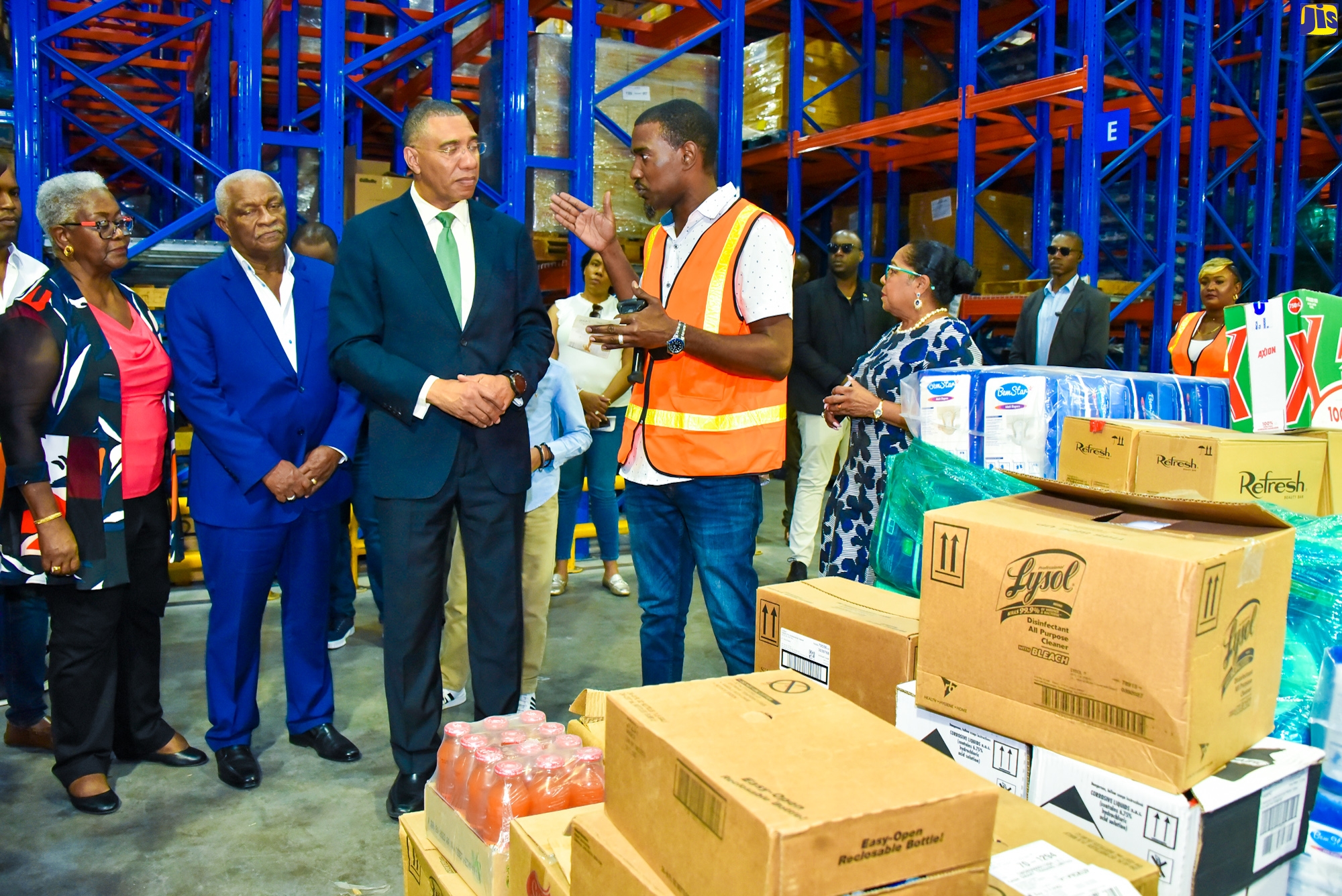 Prime Minister, the Most Hon. Andrew Holness (centre), is briefed by Inbound Supervisor, Cari-Med Group, Christopher Meikle (second right), during a tour of the company’s new distribution centre in Bernard Lodge, St. Catherine, which was officially opened on Friday (January 27). Others (from left) are Co-Founders, Cari-Med Group, Marva and Glen Christian, and Custos Rotulorum for St. Catherine, Hon. Icilyn Golding.