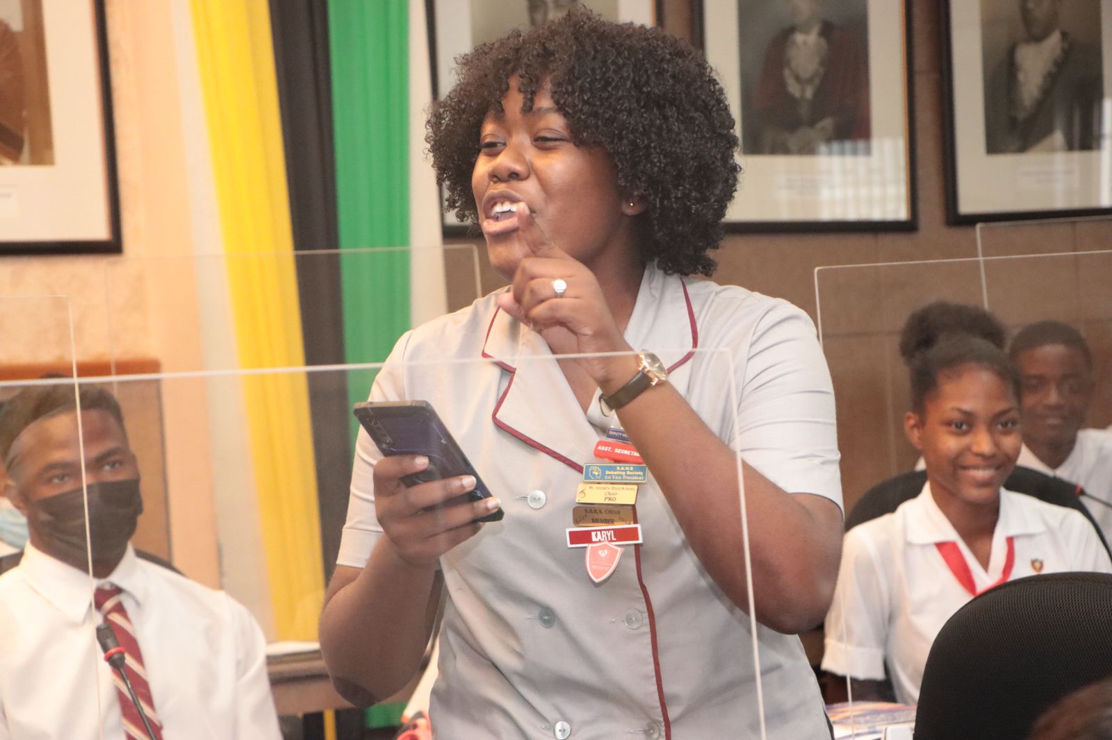 Junior Youth Coordinator of the Kingston and St. Andrew Municipal Corporation Junior Council (KSAMC JC), Karyl Thorpe, addresses a recent sitting of the Junior Council. The KSAMC JC is hosting a clothing drive for the month of January to benefit the homeless population in Kingston and St. Andrew.
