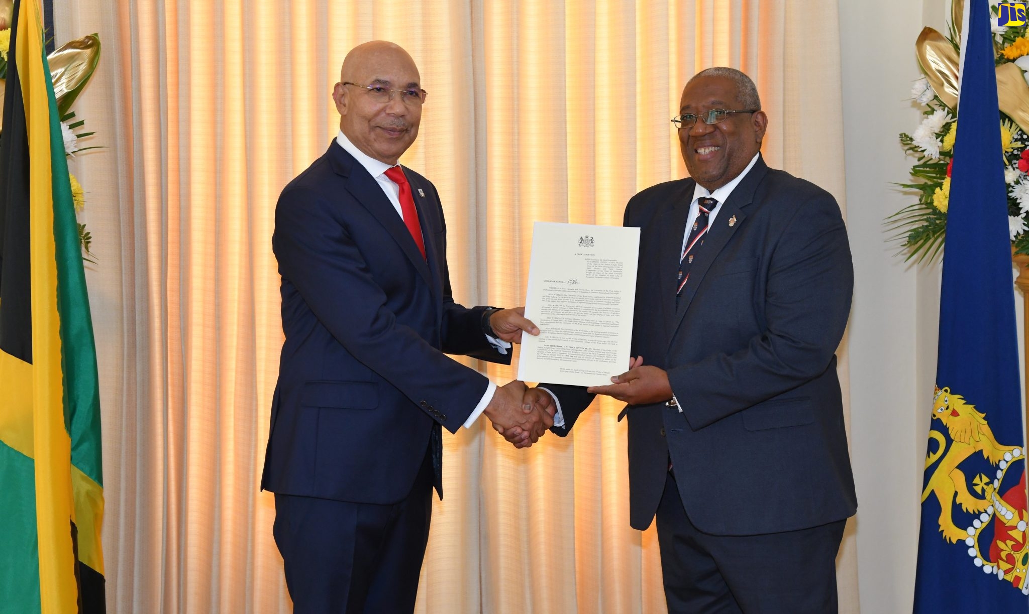 Governor-General, His Excellency, the Most Hon. Sir Patrick Allen (left), presents the signed Proclamation marking January 7 as ‘UWI Day’, to Pro-Vice Chancellor and Principal of the University of the West Indies (UWI), Mona, Professor Dale Webber, during a courtesy call at King’s House in Kingston on Thursday (January 5). The Proclamation invites all citizens to reflect on the achievements of the institution and participate in celebratory activities in observance of the UWI’s 75th anniversary.