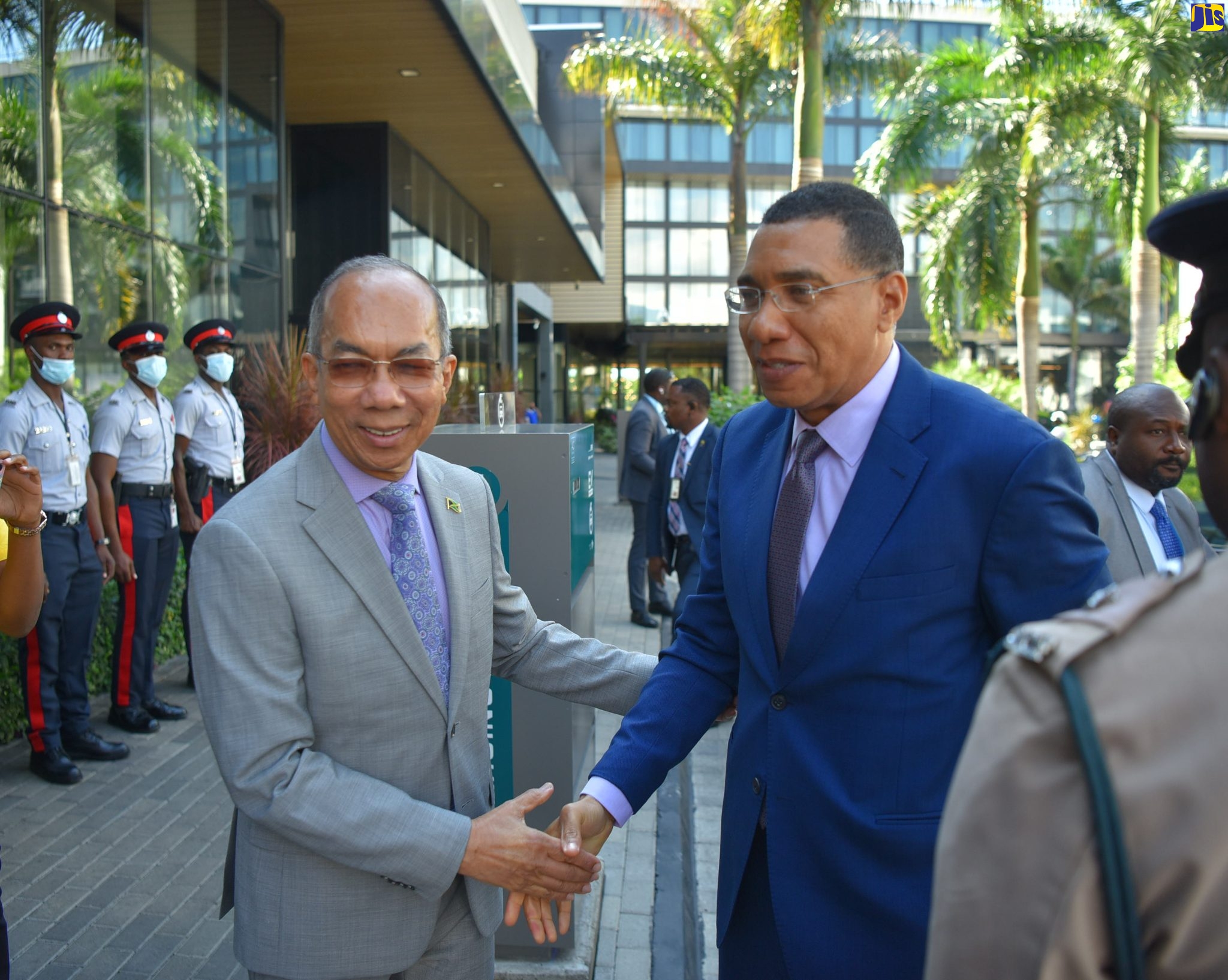 Prime Minister, the Most Hon. Andrew Holness (right), is greeted by Deputy Prime Minister and Minister of National Security, Hon. Dr. Horace Chang, as he arrives for the national security seminar hosted by the Office of the National Security Advisor, at the AC Hotel in Kingston on January 12.