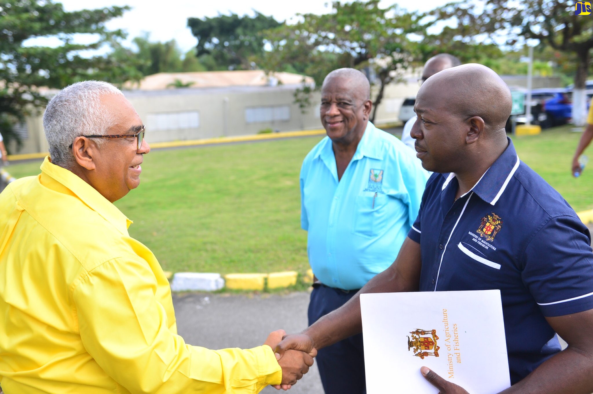 Minister of Agriculture and Fisheries, Hon. Pearnel Charles Jr. (right), is greeted by College of Agriculture, Science and Education (CASE) Alumni Association President, Pius Lacan, on arrival at the institution in Passley Gardens, Portland, on January 27, for an Intellectual Stimulation Day event. The event formed part of the CASE Founders’ Weekend activities, which were organised by the Association in collaboration with the college’s administration. Accompanying Mr. Charles Jr. is State Minister in the Agriculture Ministry, Hon. Franklyn Witter.