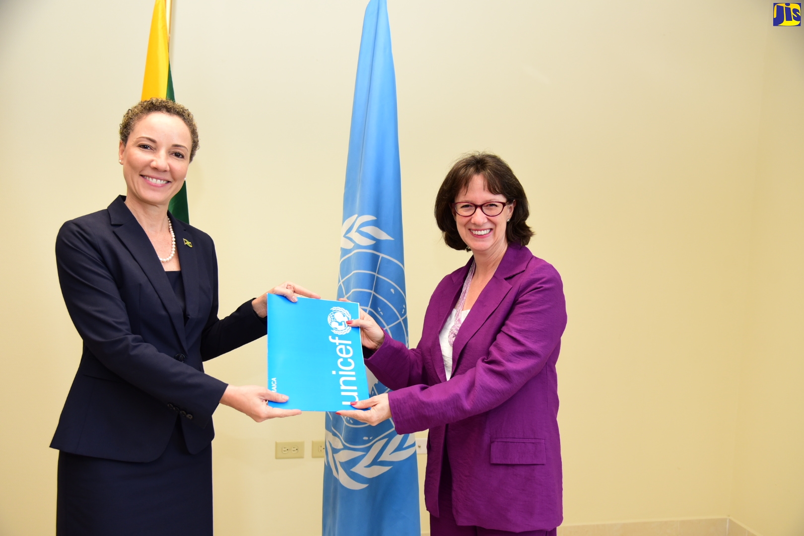 Minister of Foreign Affairs and Foreign Trade, Senator the Hon. Kamina Johnson Smith (left), receives a Letter of Introduction from new Representative for the United Nations Children’s Fund (UNICEF) Jamaica Office, Olga Isaza, who called at the Ministry’s Downtown Kingston offices on Tuesday (Feb. 21).