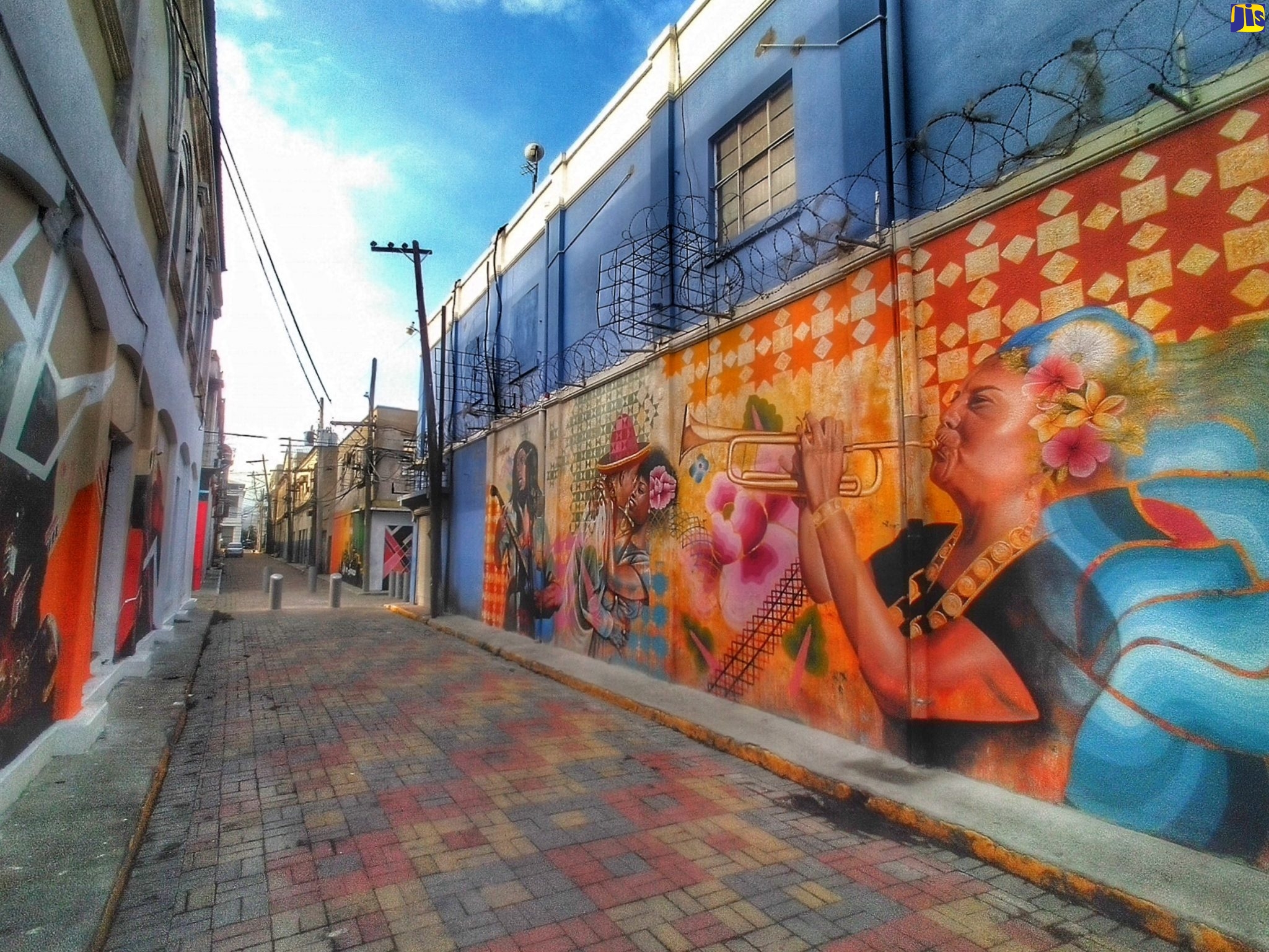 Murals of musical icons have been painted on walls along Mark Lane, downtown Kingston, and paving stones laid by the Kingston and St. Andrew Municipal Corporation (KSAMC).