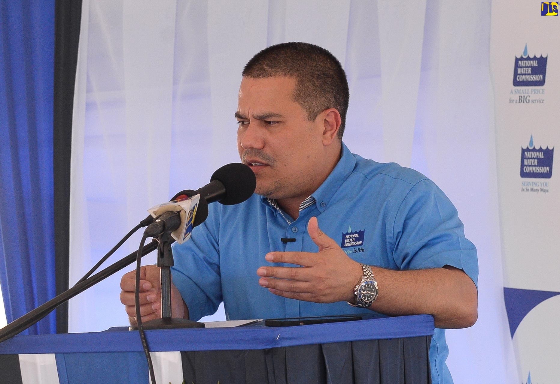 Minister without Portfolio in the Ministry of Economic Growth and Job Creation, Senator the Hon. Matthew Samuda, addresses the recent commissioning of a 50,000-gallon storage tank in York Town, Clarendon.