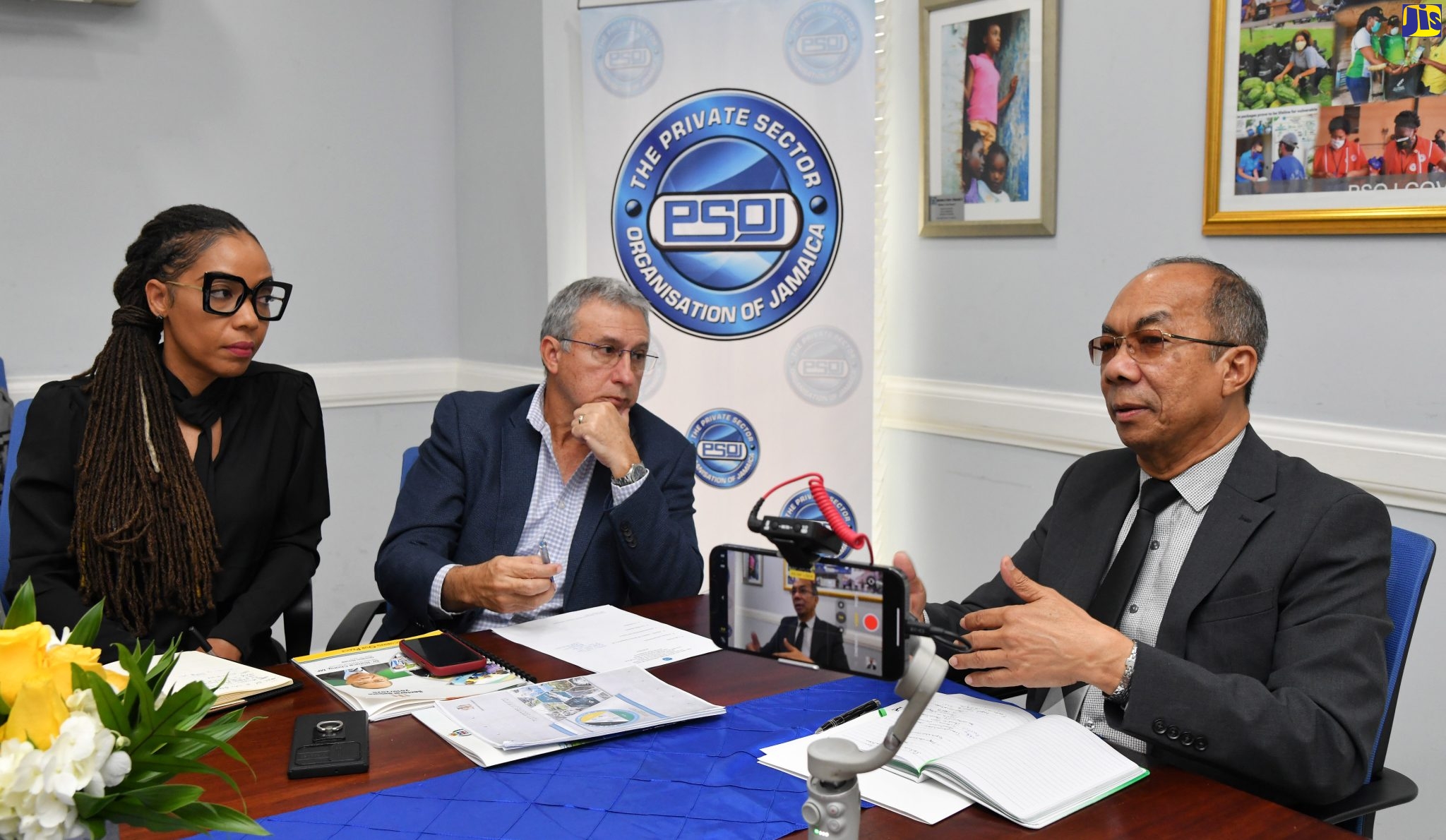 Deputy Prime Minister and Minister of National Security, Hon. Dr. Horace Chang (right), speaking during a recent meeting with members of the Private Sector Organisation of Jamaica (PSOJ) at the entity’s Hope Road offices in St. Andrew. Listening (from left) are PSOJ Executive Director, Imega Breese McNab, and President, Metry Seaga.