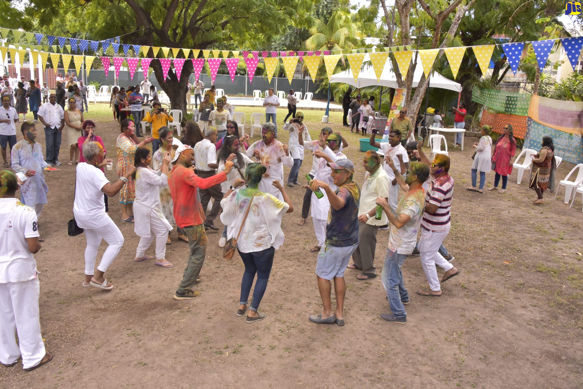 Members of the local Indian community participate in last year’s Holi Festival on the grounds of India House at 2 East King’s House Road, St. Andrew.