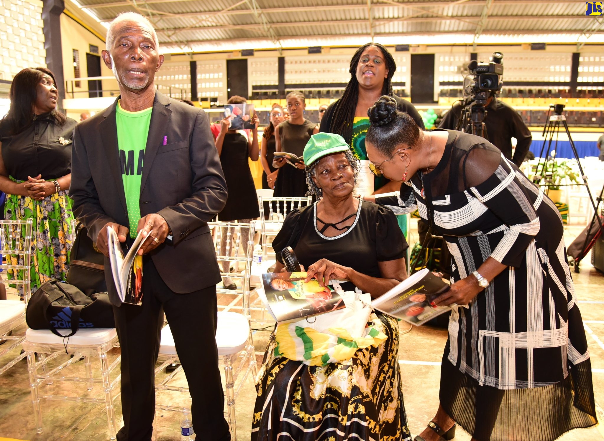 Minister of Culture, Gender, Entertainment and Sport, Hon. Olivia Grange (right), comforts Beryl Edwards, mother of late former national women’s basketball representative, Simone Edwards, during a Service of Thanksgiving for the athlete, on Wednesday (March 15), at the University of Technology (UTech) in St. Andrew. At left is Ms. Edwards’ father, Aston Edwards.
