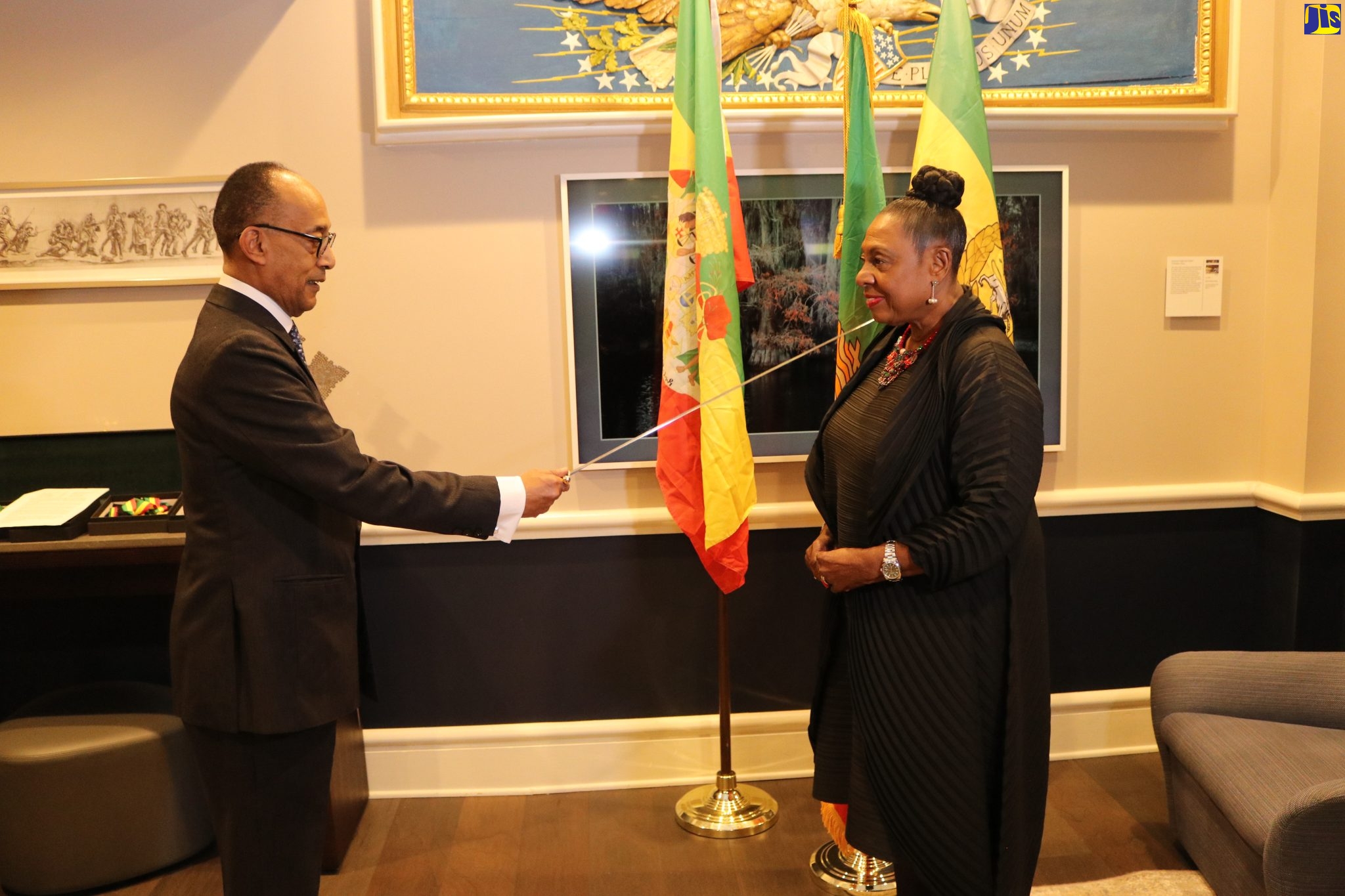 Minister of Culture, Gender, Entertainment and Sport, Hon. Olivia Grange (right) is conferred with The Dame Grand Cross of the Imperial Order of the Star of Honour of Ethiopia, by His Imperial Highness Prince Ermias Sahle-Selassie, on March 4, at a special ceremony in Washington DC. 