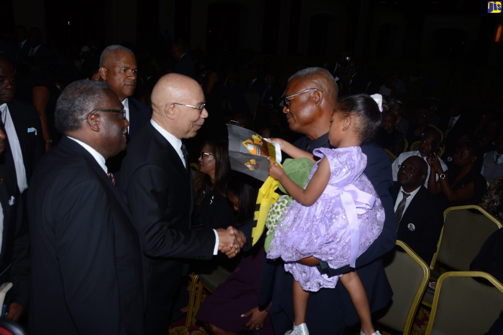 Governor General,  His Excellency the Most Hon. Sir Patrick Allen (centre), expresses condolences to Dean Corrodus (right), son of the late former St James Custos, Hon. Ewen Corrodus, at the funeral service for the late Custos held at the Montego Bay Convention Centre in Rose Hall on Sunday, March 19. Looking on (from left) are the current Custos of St James, Bishop Conrad Pitkin, and another son of the late Custos, Paul Corrodus. 

