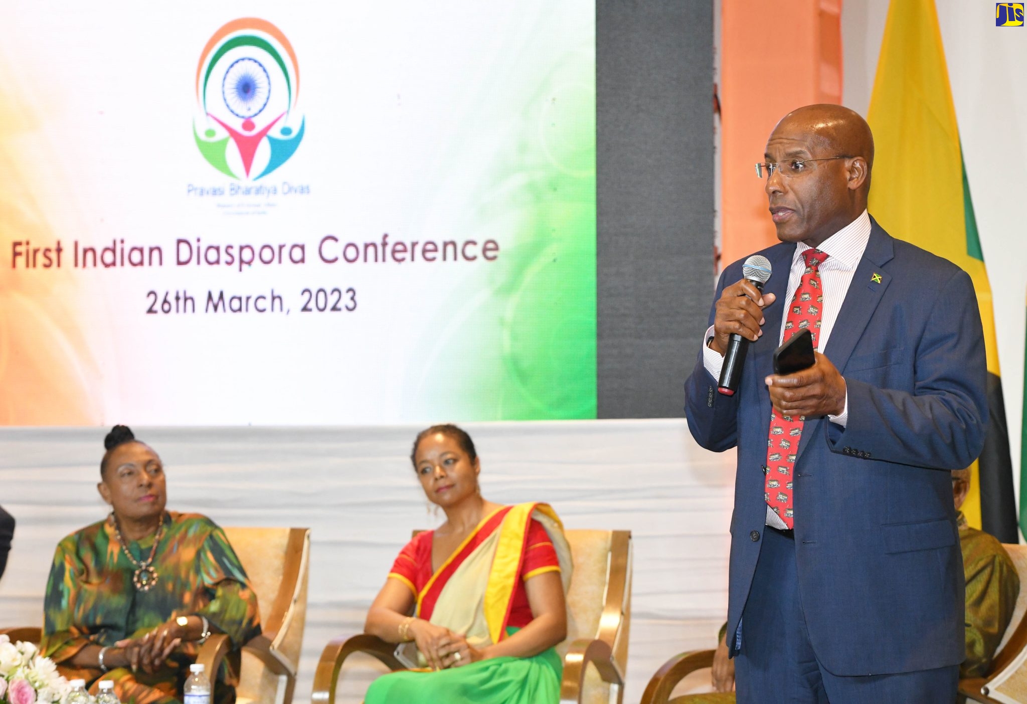 Minister of Industry, Investment and Commerce, Senator the Hon. Aubyn Hill (right), addresses the Indian Diaspora Conference, held at The Jamaica Pegasus hotel on March 26. Since the first arrival of Indians in Jamaica in 1845, they have become an integral part of the Jamaican society, contributing to the progress of the country, while they continue to retain their culture and roots. Others (from left) are Minister of Culture, Gender, Entertainment and Sport, Hon. Olivia Grange and Minister of Legal and Constitutional Affairs, Hon. Marlene Malahoo Forte.