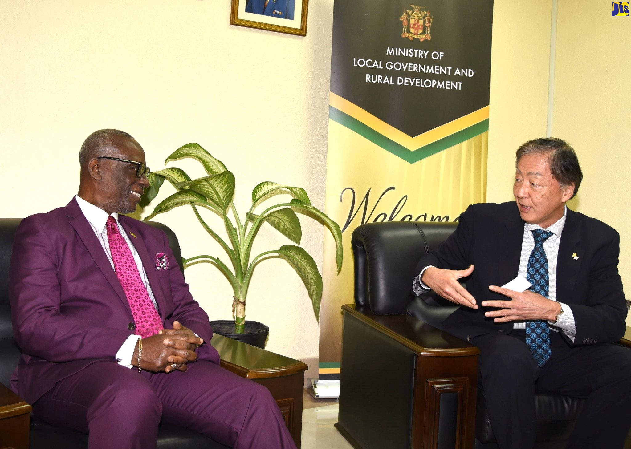 Minister of Local Government and Rural Development, Hon. Desmond McKenzie (left), in discussion with Japan’s Ambassador to Jamaica, His Excellency Yasuhiro Atsumi, during a courtesy call at the Ministry’s Hagley Park Road offices in Kingston, on Tuesday (March 7).
