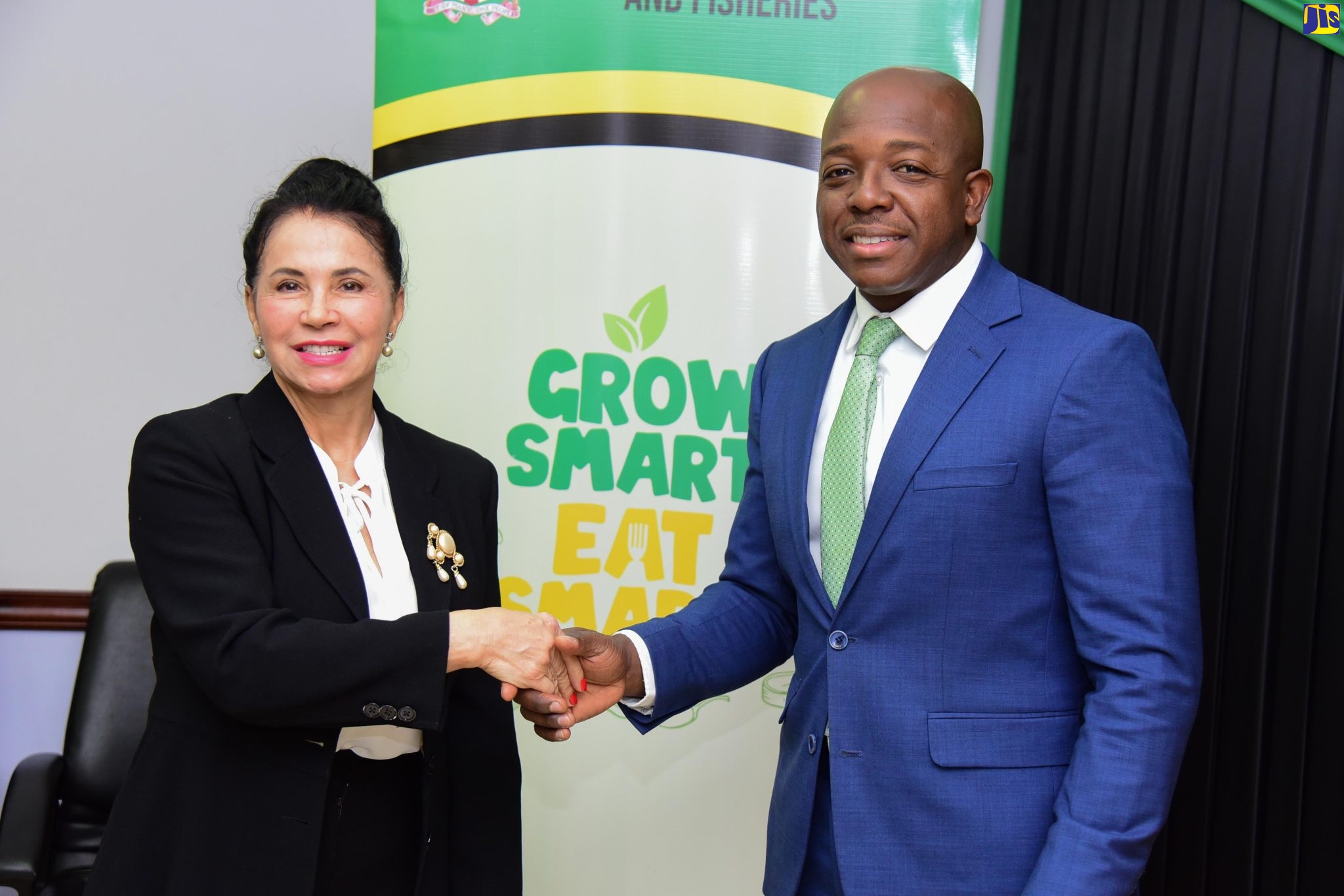 Minister of Agriculture and Fisheries, Hon. Pearnel Charles Jr. (right), shakes hands with Brazil’s Ambassador to Jamaica, Her Excellency Elza Moreira Marcelino de Castro, during the diplomat’s courtesy call at the Ministry’s Hope Gardens offices in St. Andrew, on Thursday (March 30).