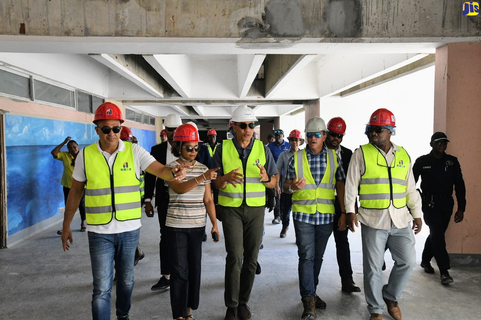 Prime Minister, the Most Hon. Andrew Holness (centre), tours the Cornwall Regional Hospital (CRH) in Montego Bay, St. James, on Saturday (April 1) to view the progress of the facility’s rehabilitation project. Among the persons accompanying him are (from left) Minister of Health and Wellness, Dr. the Hon. Christopher Tufton; Minister of Legal and Constitutional Affairs, Hon. Marlene Malahoo Forte; CRH Project Manager, Vivian Gordon; and St James Central Member of Parliament, Heroy Clarke. 