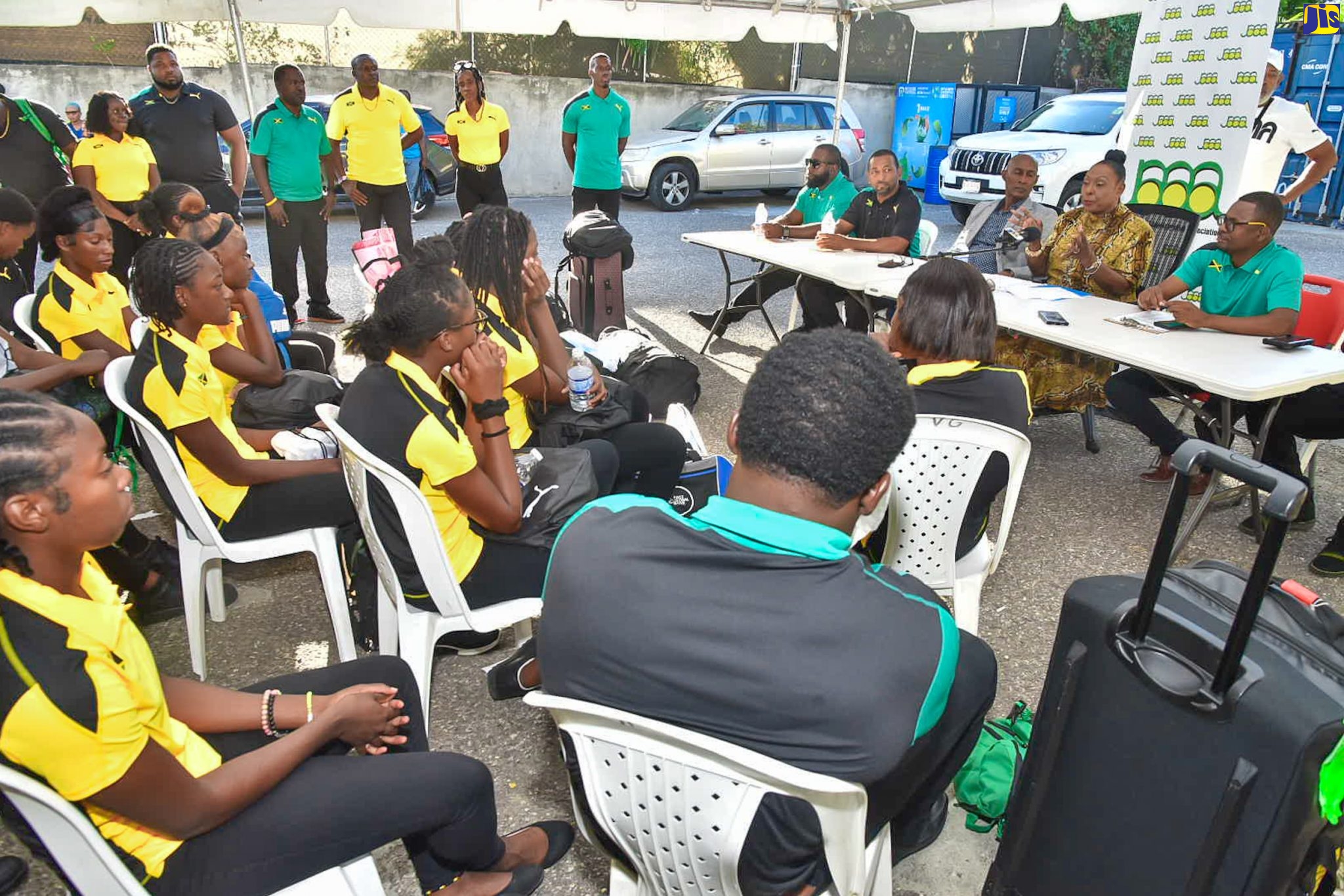 Minister of Culture, Gender, Entertainment and Sport, Hon. Olivia Grange (second right), shares a word of encouragement with Jamaica’s CARIFTA Games team members, during a send-off ceremony held at the Jamaica Athletics Administrative Association (JAAA) offices in Kingston on April 6. The CARIFTA Games are scheduled for April 8-10 in Nassau, Bahamas.