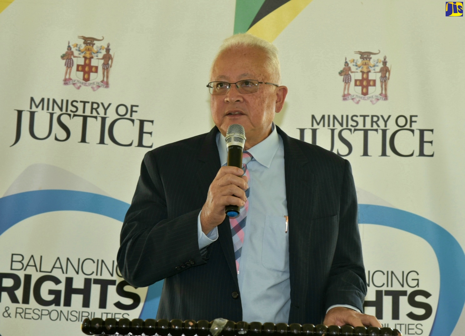 Minister of Justice, Hon. Delroy Chuck, addresses the St. Thomas Justice Fair at Rudolph Elder Park in Morant Bay, on Friday (April 21).