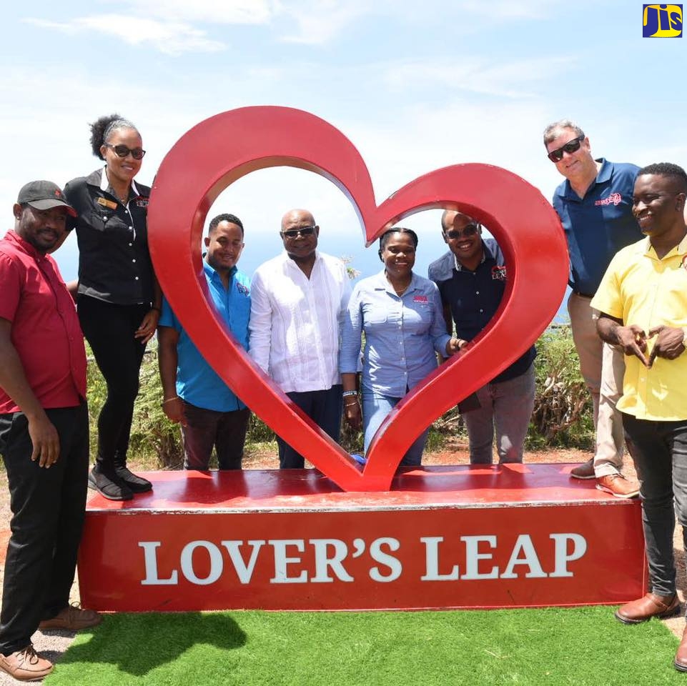 Minister of Tourism, Hon. Edmund Bartlett (fourth left) and Permanent Secretary in the Ministry of Tourism, Jennifer Griffith (fifth left), with workers and other South Coast stakeholders at the Lover’s Leap attraction in St. Elizabeth, on April 27.