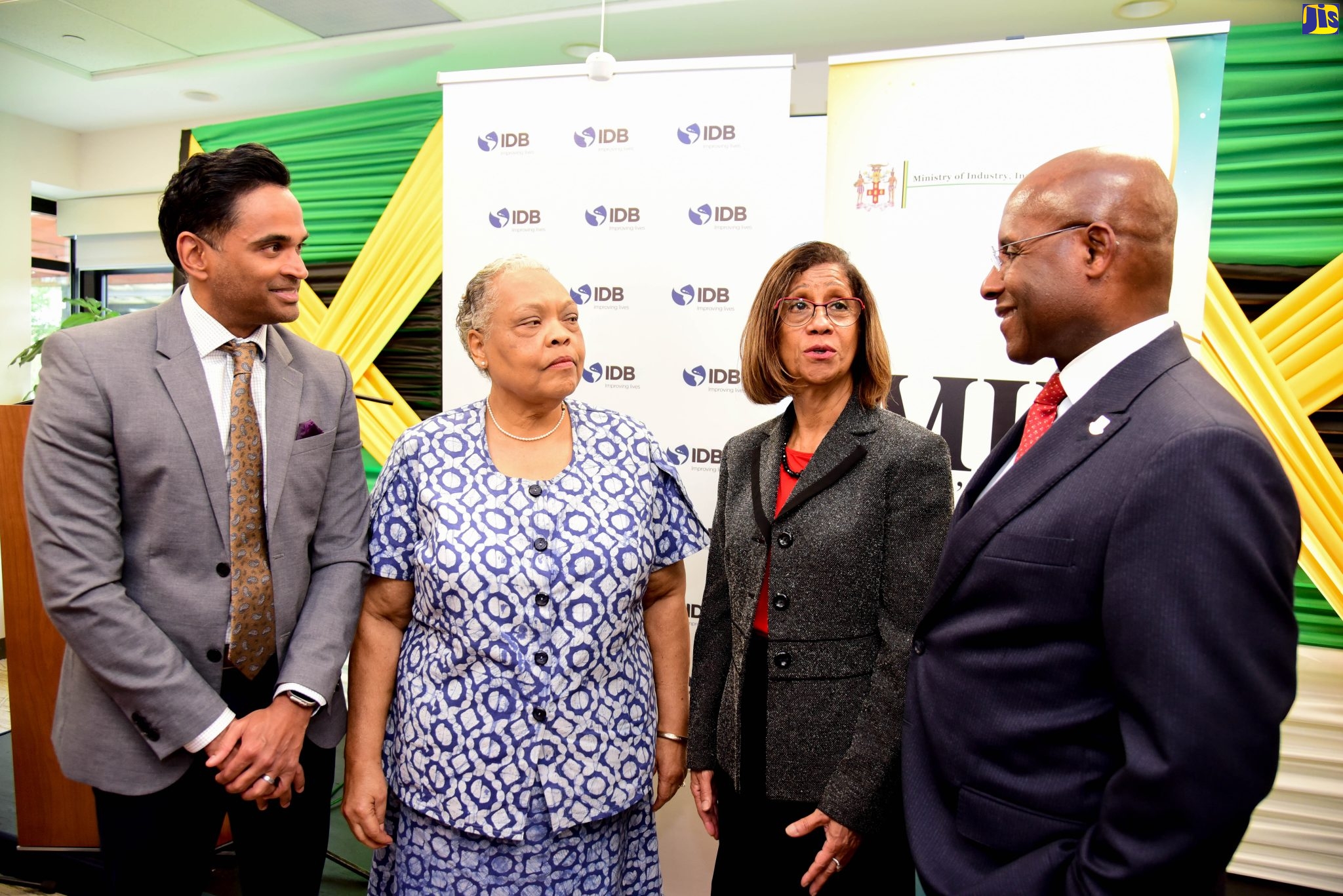 Minister of Industry, Investment and Commerce, Senator the Hon. Aubyn Hill (right), shares in light conversation with (from left) General Manager, Caribbean Country Department and Country Representative for Jamaica, Inter-American Development Bank (IDB), Tariq Alli; Chief Executive Officer, Jamaica Business Development Corporation (JBDC), Valerie Viera and Permanent Secretary in the Ministry, Sancia Bennett Templer, at the launch of the ‘MSME Business Roadshow’ on May 30 at the IDB offices in St. Andrew.