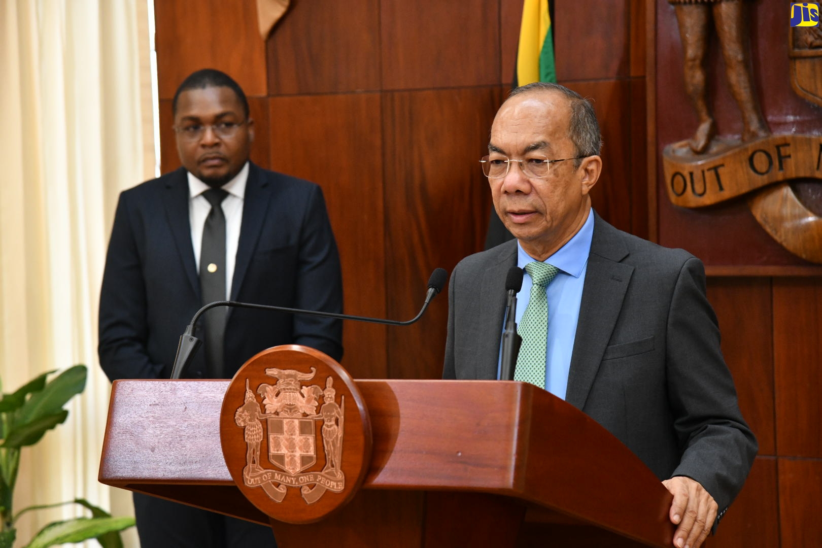 Deputy Prime Minister and Minister of National Security, Hon Dr. Horace Chang (right), addressing journalists during a post-Cabinet Press Briefing at Jamaica House, on Wednesday (May 3). Listening is Minister Without Portfolio in the Office of the Prime Minister with Responsibility for Information, Hon. Robert Morgan. 