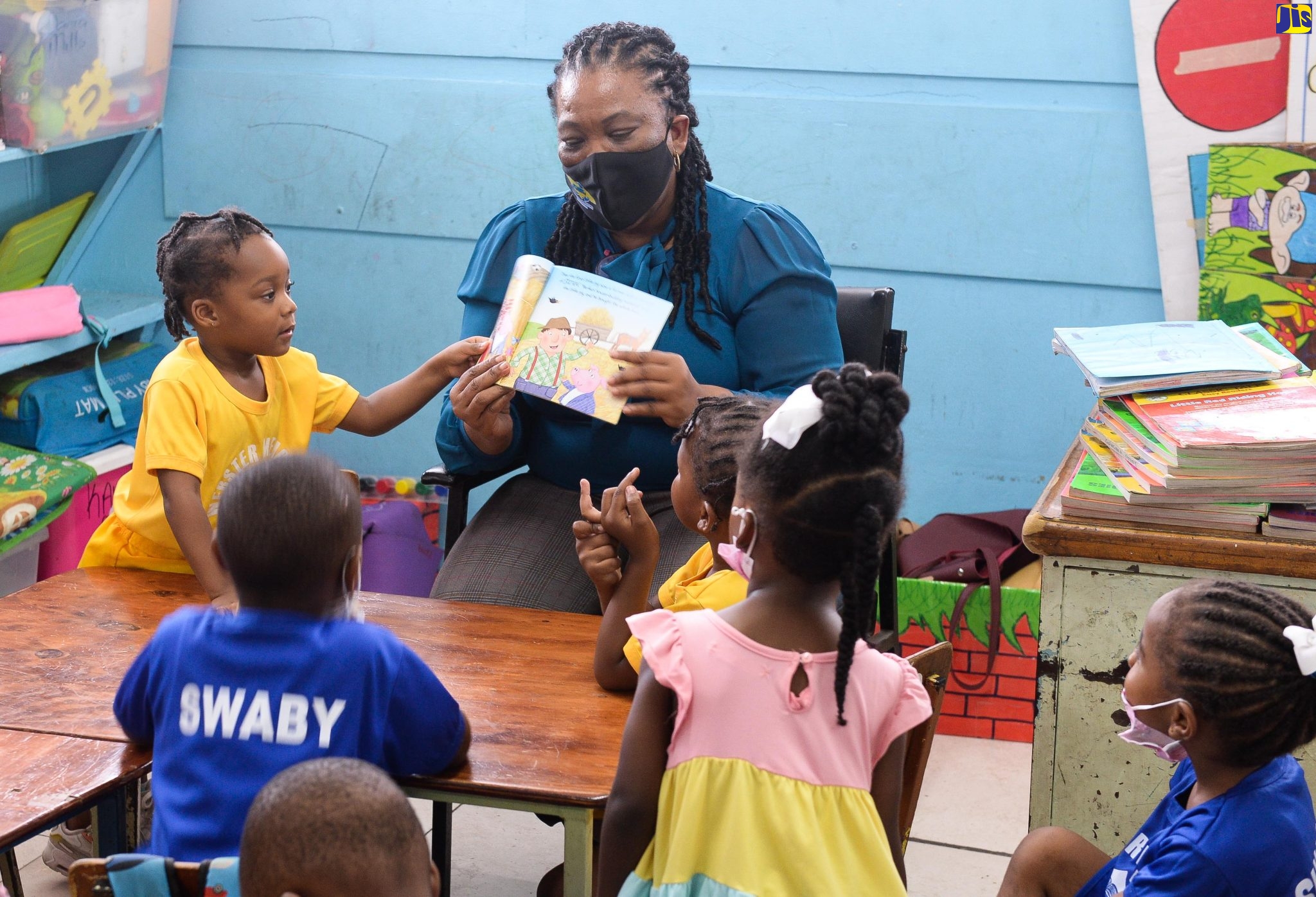 PHOTOS NSWMA Leads ‘Read Across Jamaica Day’ Activity at Webster