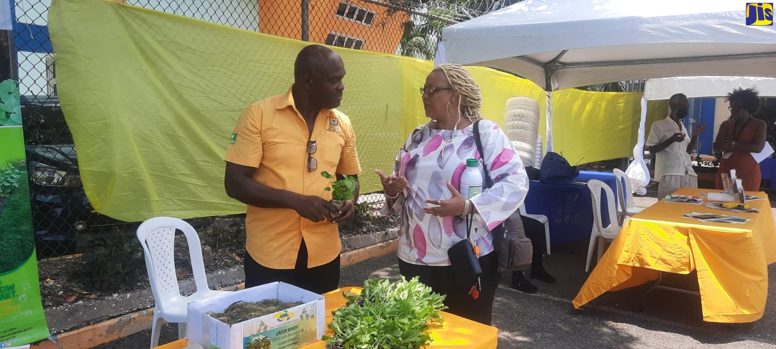 Land Management Officer at the Rural Agricultural Development Authority, Robert Tulloch (left), with Compost Expo patron, Carolyn Stewart. The Expo was held at the National Solid Waste Management Authority’s head office in Kingston on May 12.