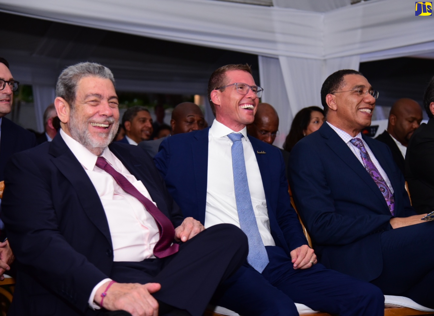 Prime Minister, the Most Hon. Andrew Holness (right), enjoys a light moment during the ceremony for the opening of the Sandals Dunn’s River Hotel in Mammee Bay, St. Ann on May 19. Sharing the moment are Prime Minister of St. Vincent and the Grenadines, Dr. the Hon. Ralph Gonsalves (left) and Executive Chairman of Sandals Resorts International, Adam Stewart.