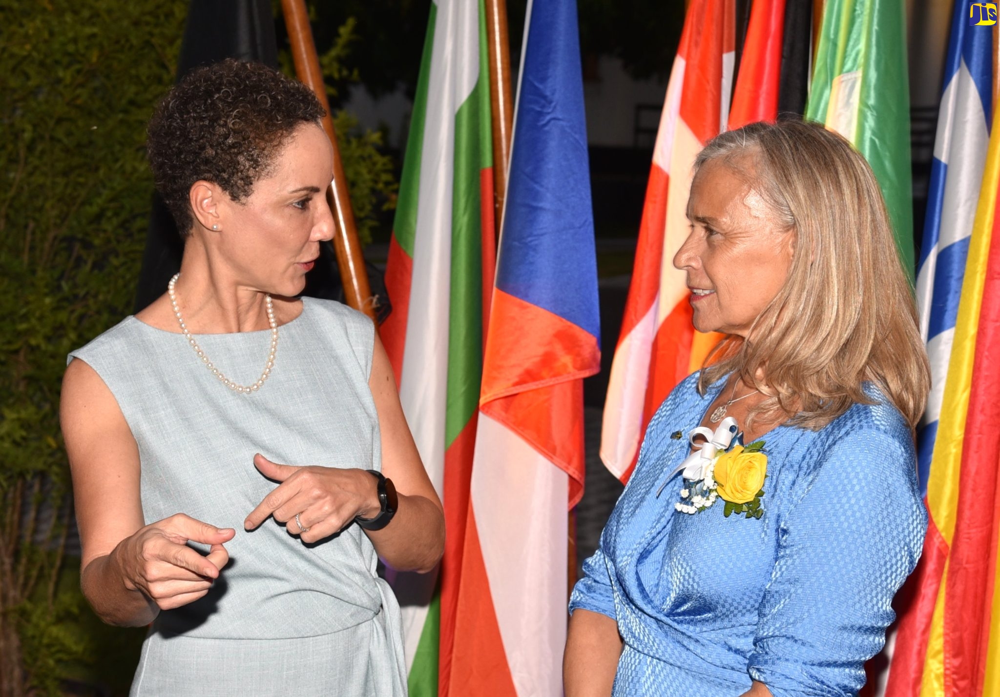 Minister of Foreign Affairs and Foreign Trade, Senator the Hon. Kamina Johnson Smith (left), is in discussion with Ambassador, Delegation of the European Union (EU) to Jamaica, Her Excellency Marianne Van Steen, during the Europe Day Reception on Tuesday (May 9), at the EU offices in Kingston.