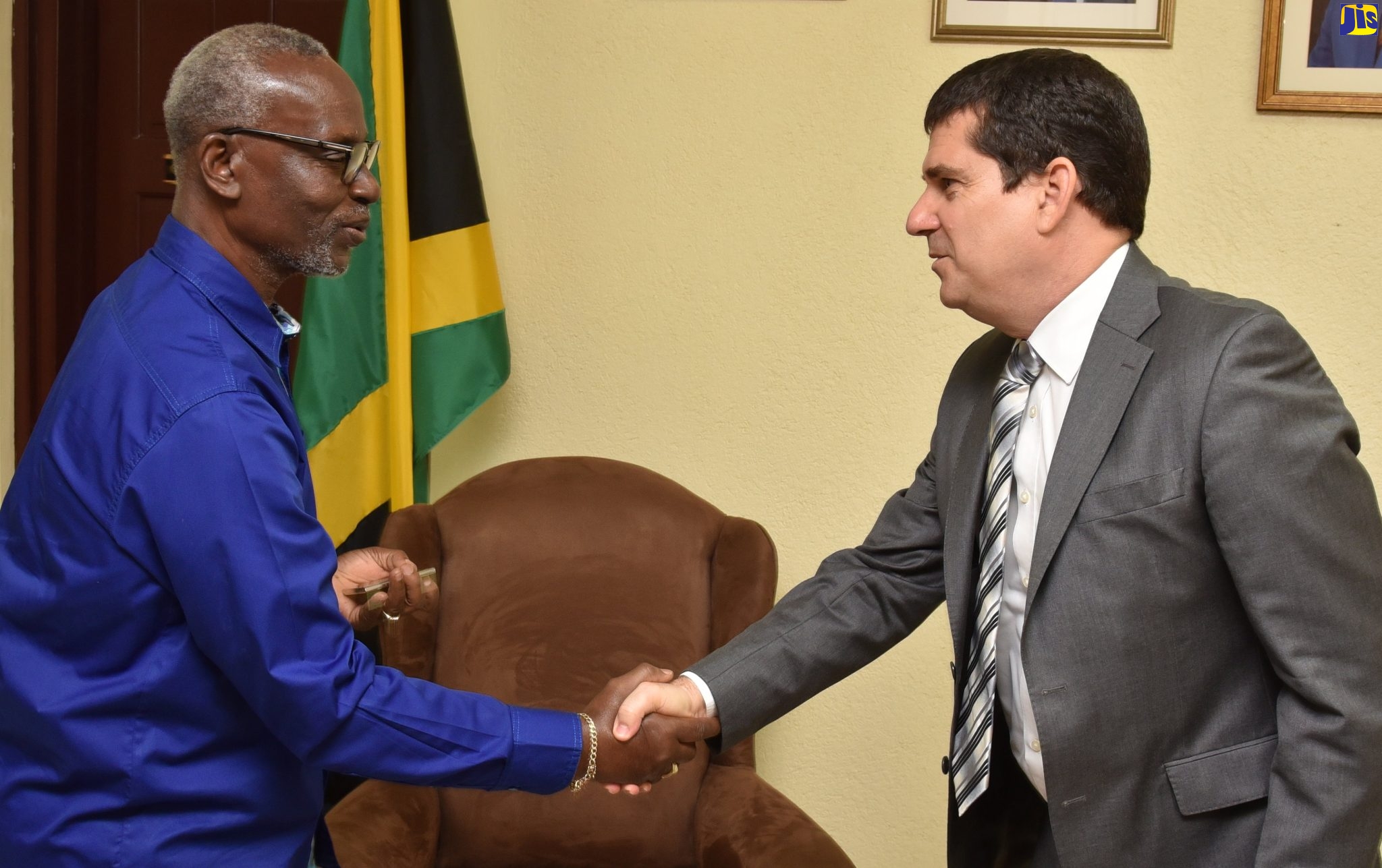 Minister of Local Government and Community Development, Hon. Desmond McKenzie (left), greets Cuba’s Ambassador to Jamaica, His Excellency Fermín Quiñones Sánchez, during a courtesy call on Friday (May 26), at the Ministry’s offices in Kingston.