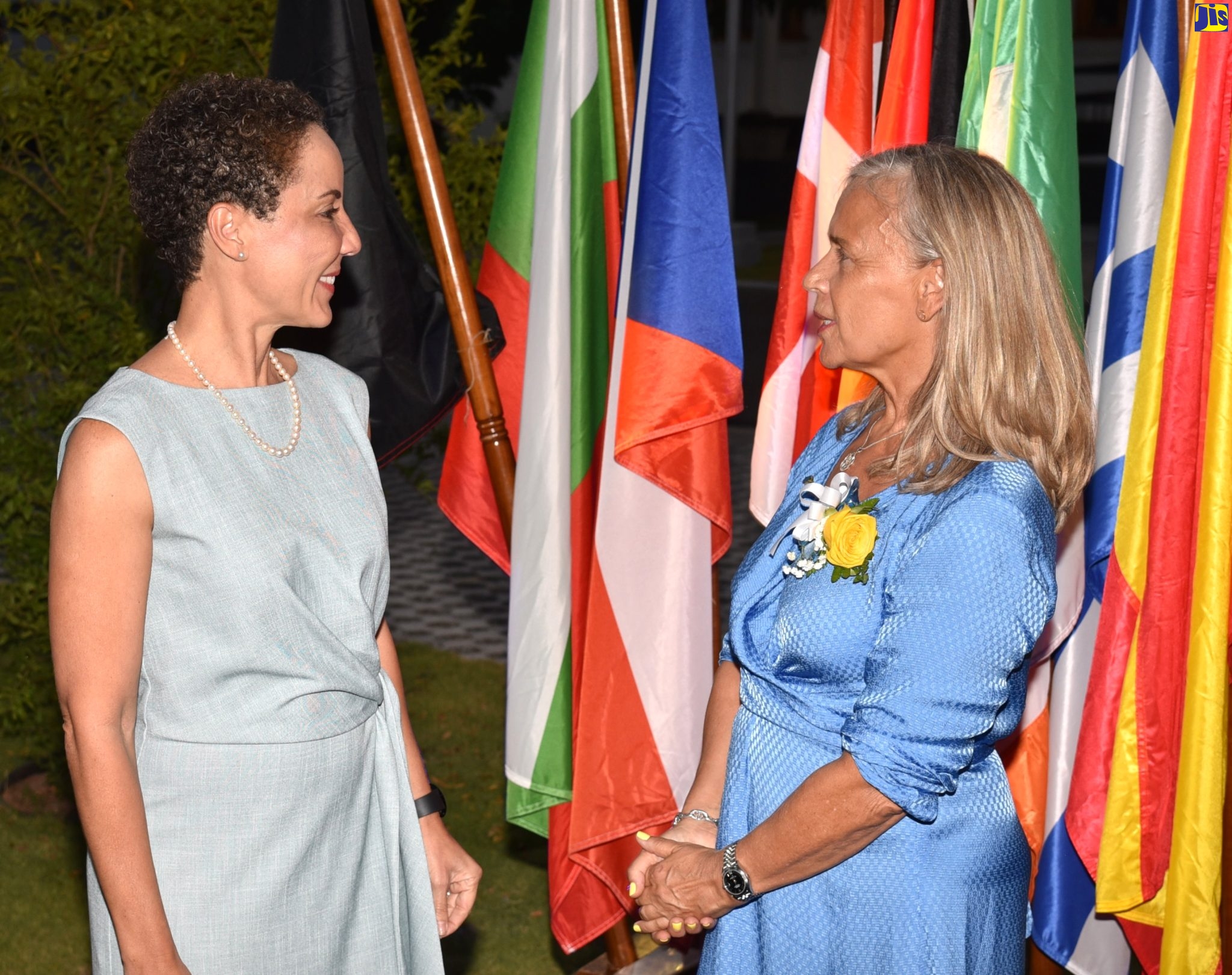Minister of Foreign Affairs and Foreign Trade, Senator the Hon. Kamina Johnson Smith (left), in discussion with Ambassador, Delegation of the European Union (EU) to Jamaica, Her Excellency Marianne Van Steen, at the Delegation of the European Union to Jamaica Europe Day Reception 2023, on Tuesday (May 9), at the EU offices in Kingston.