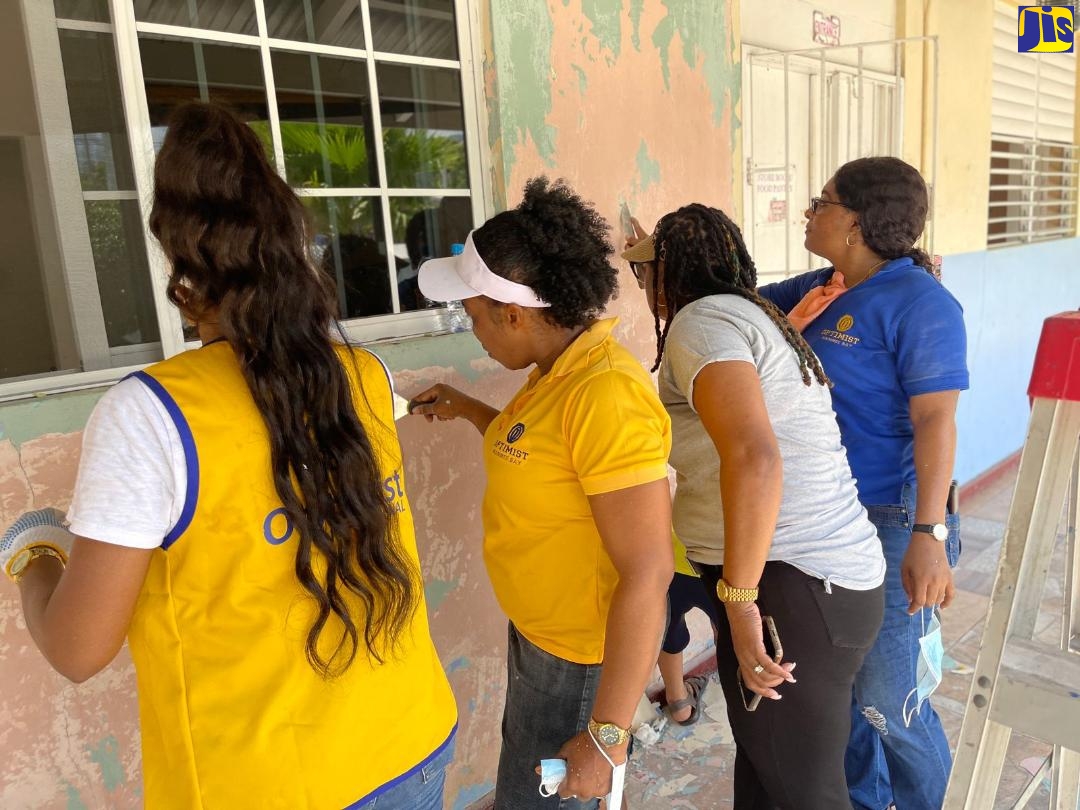 Volunteers at the St Ann Infirmary, giving the place a much-needed facelift on Labour Day (May 23).