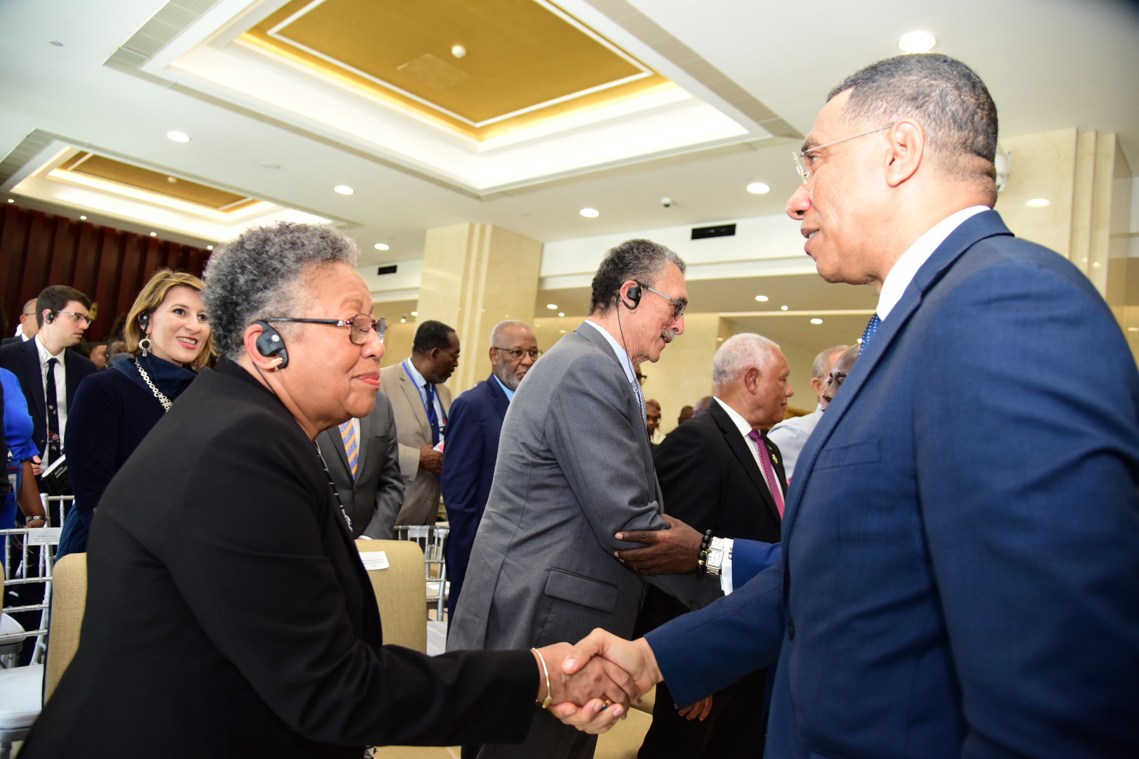 Prime Minister, the Most Hon. Andrew Holness (right), greets CARICOM Secretary General, Dr. Carla Barnett during the opening ceremony of the meeting of Haitian Stakeholders at the Ministry of Foreign Affairs and Foreign Trade in downtown Kingston on Sunday, June 11.

 

 

 
