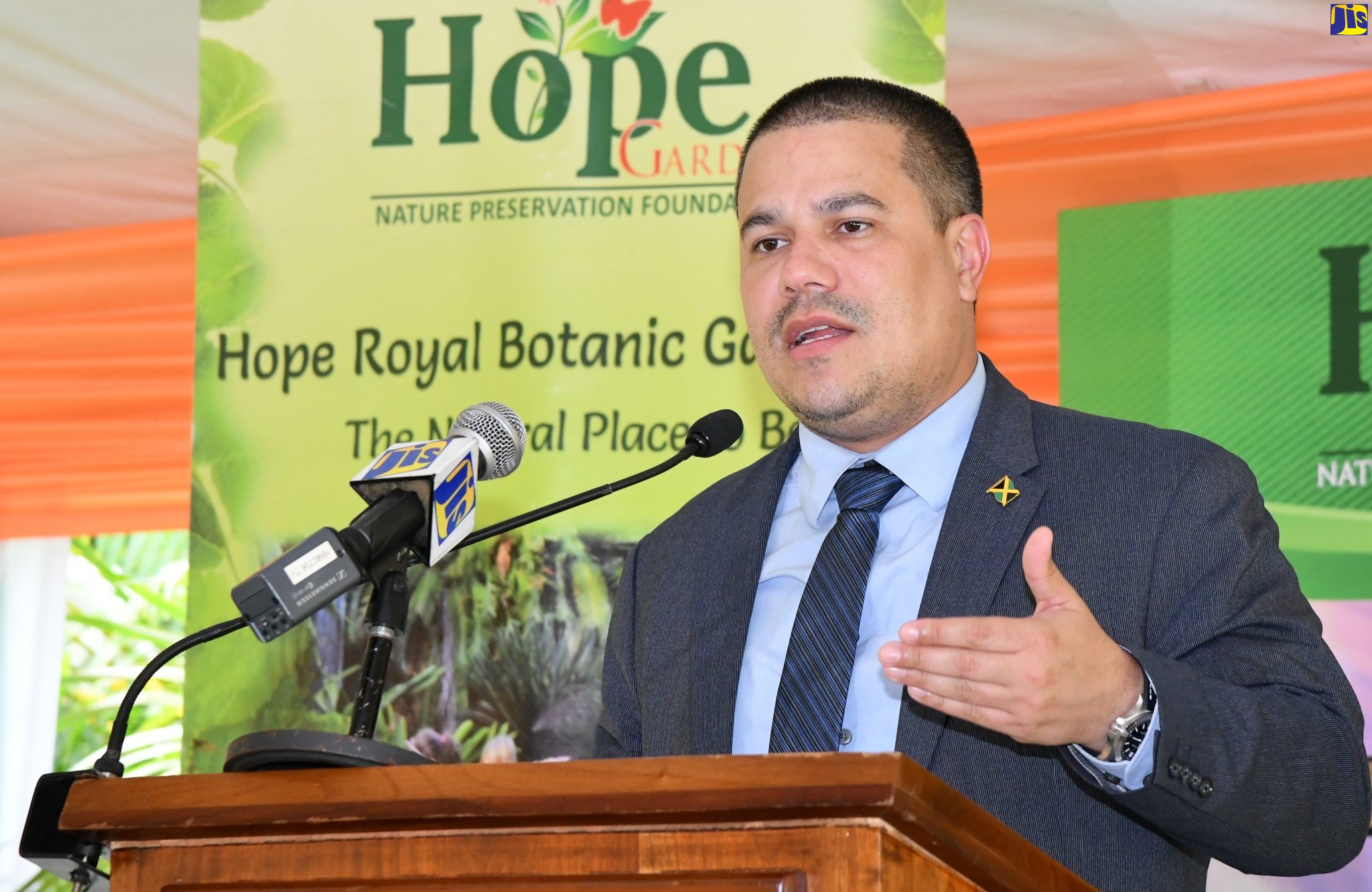 Minister without Portfolio in the Ministry of Economic Growth and Job Creation, Senator the Hon. Matthew Samuda, delivers the keynote address at the Hope Gardens 150th Anniversary Public Forum on Urban Green Spaces, in St. Andrew, on May 31.