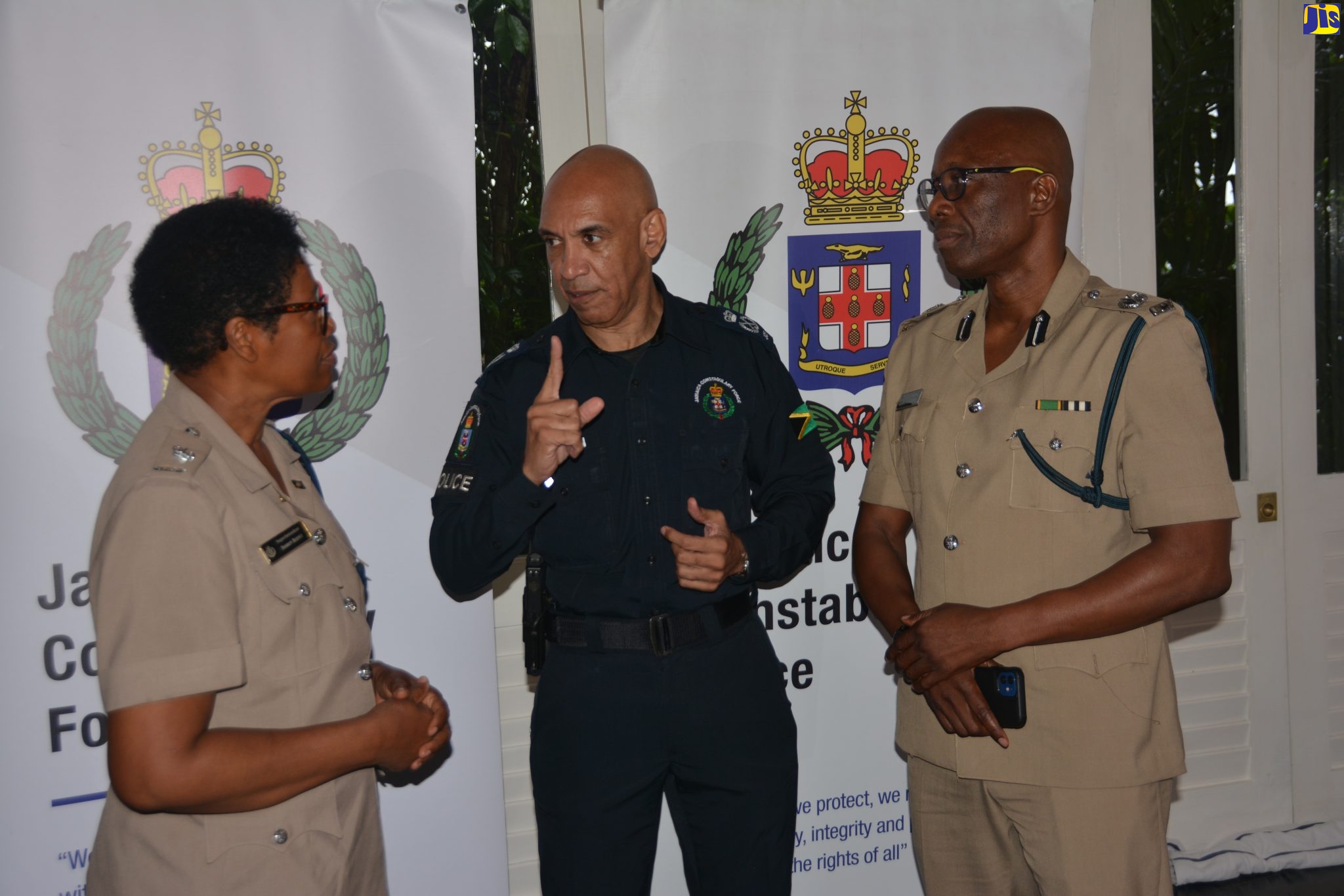 Commissioner of Police, Major General Antony Anderson (centre), makes a point to Commending Officer for Hanover, Superintendent Sharon Beeput (left), during a stakeholder engagement at Round Hill Hotel and Villas in the parish on Tuesday, June 6. Sharing in the discussion is Head of Police Area One, Assistant Commissioner of Police, Clifford Chambers.